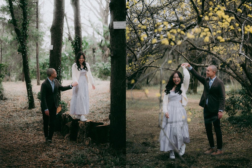 A couple having a photoshoot in a forest during spring, with the woman standing on a tree stump and the man holding her hand, while in another shot he twirls her among yellow flowering trees.