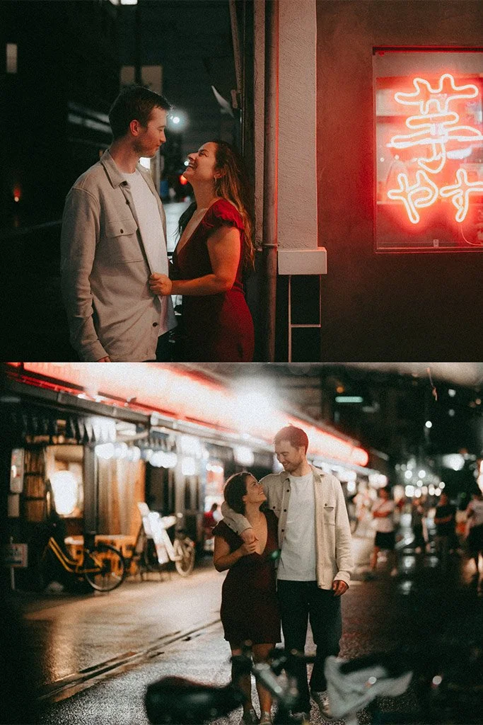 A young couple is standing close together outside a building at night, smiling at each other. The woman has long hair and is wearing a red dress, while the man has short hair and is wearing a light-colored jacket. In the second image, the couple is w
