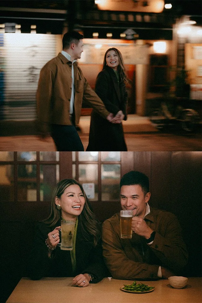 Two couples enjoying drinks and laughing in a cozy bar or pub setting. One couple is dancing in the background, and the other is seated at a table holding mugs of beer with plates of food.
