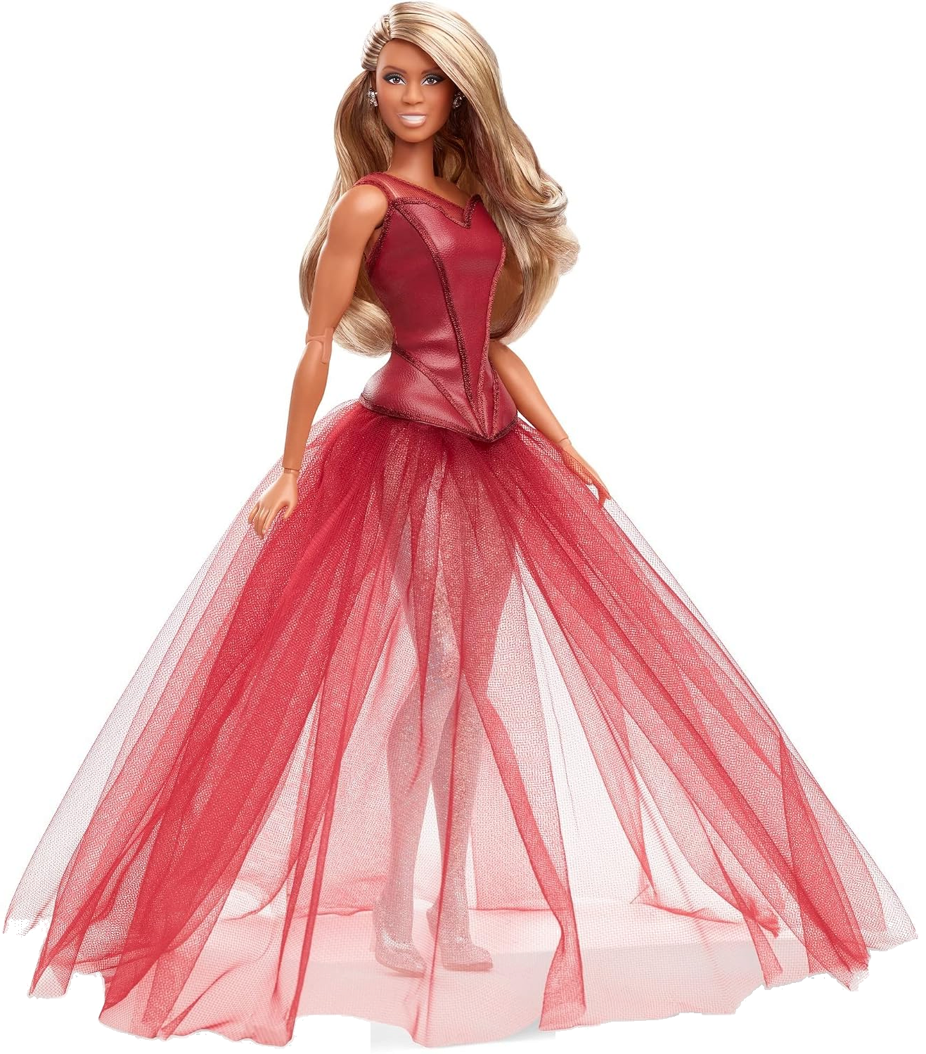 A Barbie doll wearing a red ball gown with a fitted bodice and a voluminous tulle skirt.