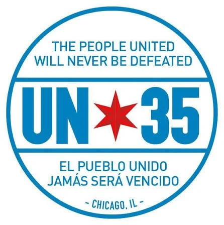 A circular logo with blue text and a red star in the center. The logo reads "The people united will never be defeated," "UN 35," "El pueblo unido jamás será vencido," and "Chicago, IL."