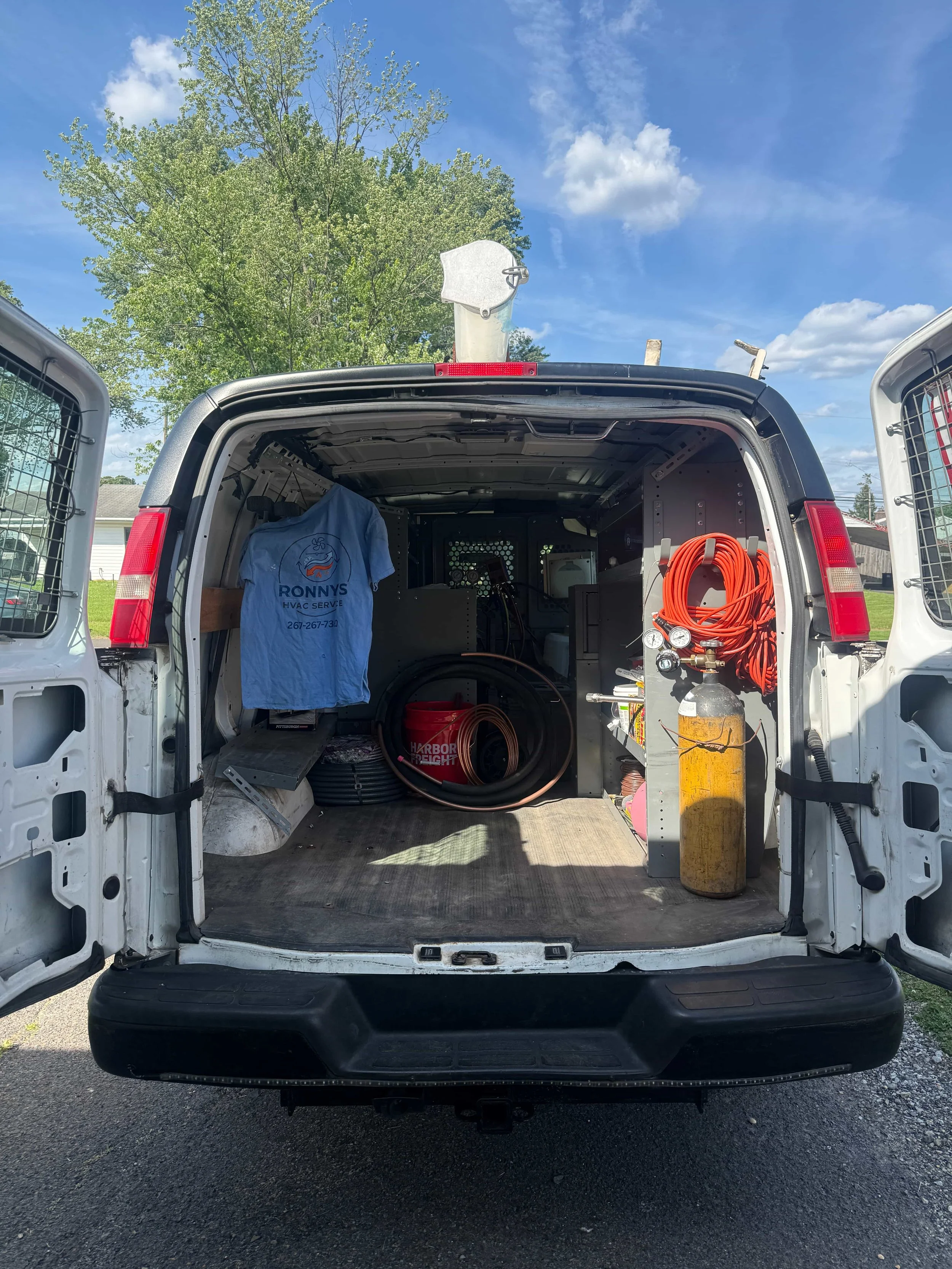 Work van with back doors open