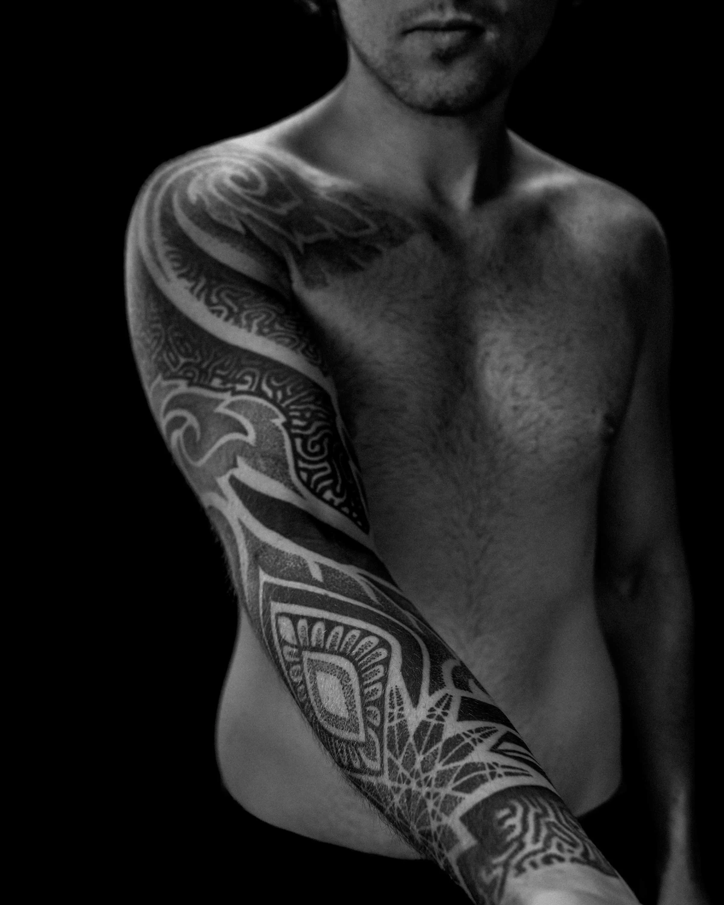 ornamental-blackwork-chest-and-sleeve-tattoo-patrick-huettlinger