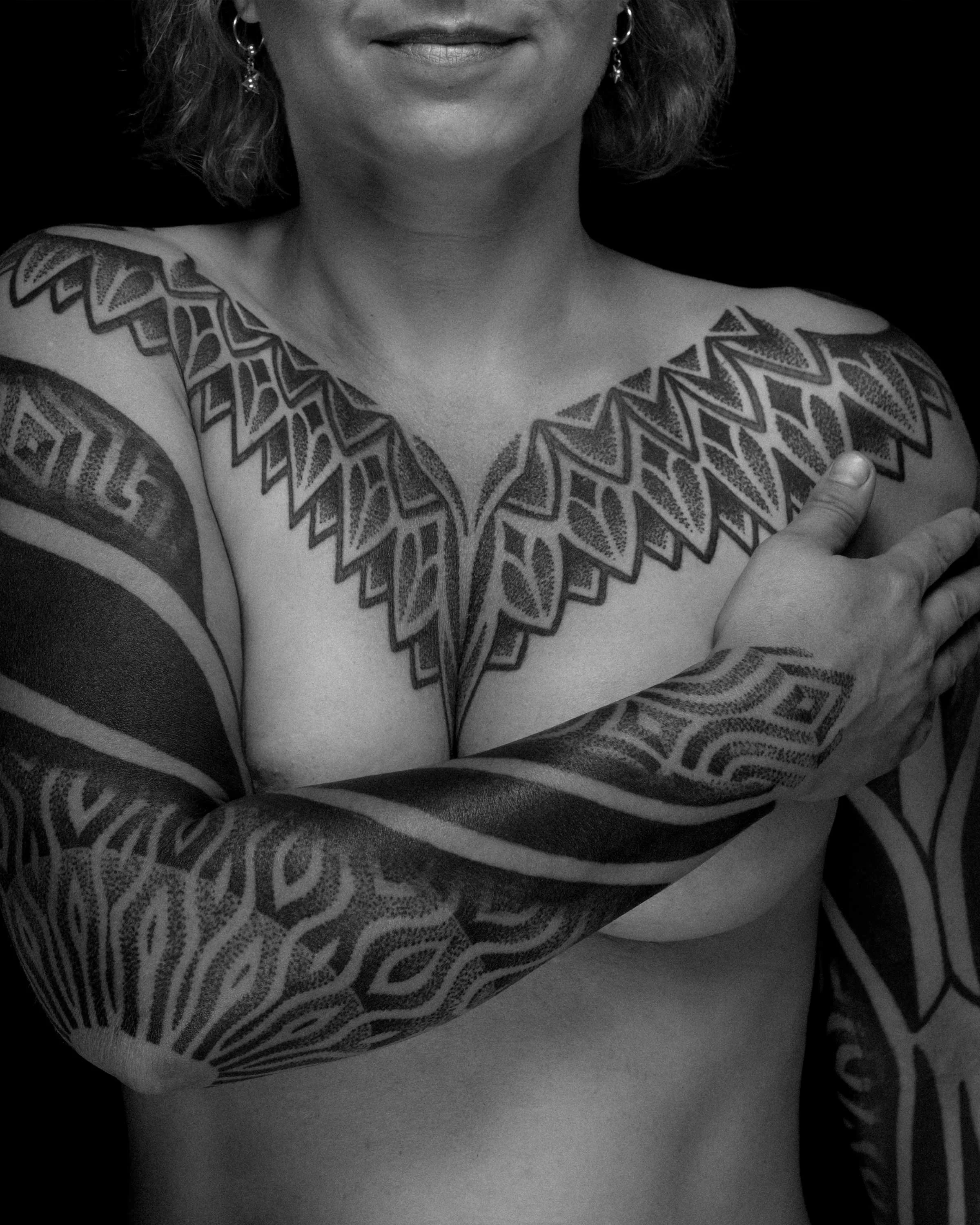 ornamental-blackwork-chest-and-sleeve-tattoo-patrick-huettlinger