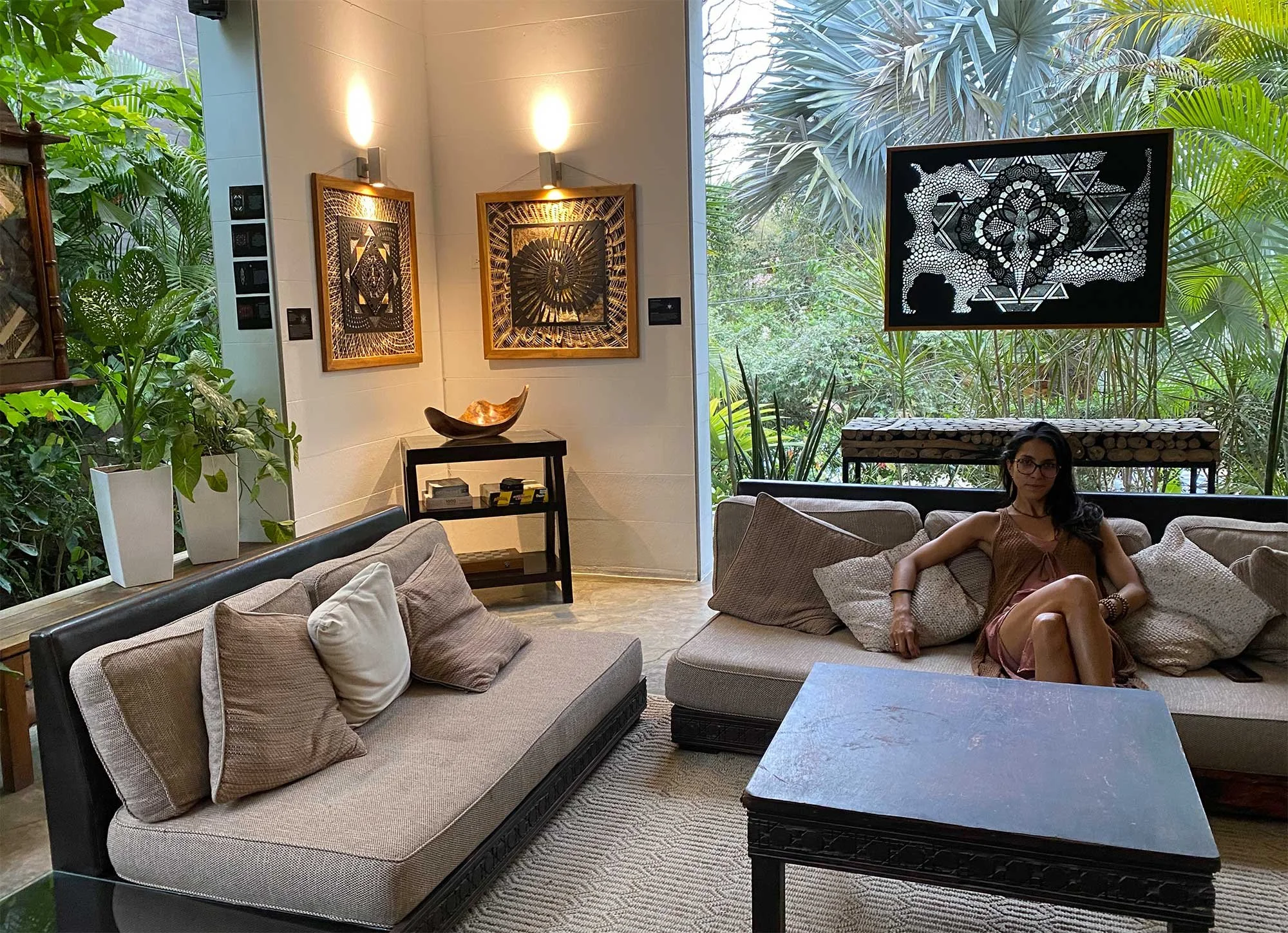 Photonic Pointillism Lightworks integrated into a contemporary residential interior, interacting with natural light and surrounding architecture.
