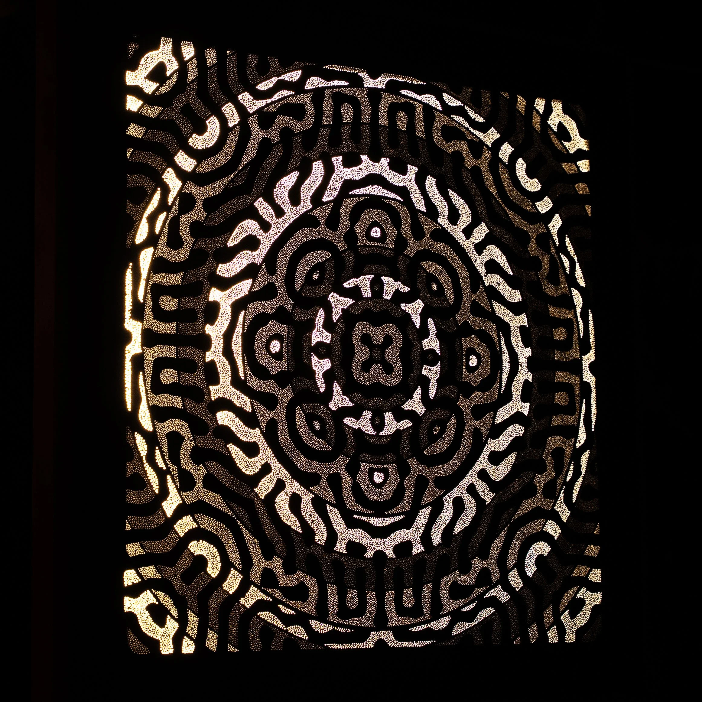 Left-side view of Shiva's Shakti revealing the depth, hand-drilled perforations and sculptural construction of the Photonic Pointillism Lightwork.