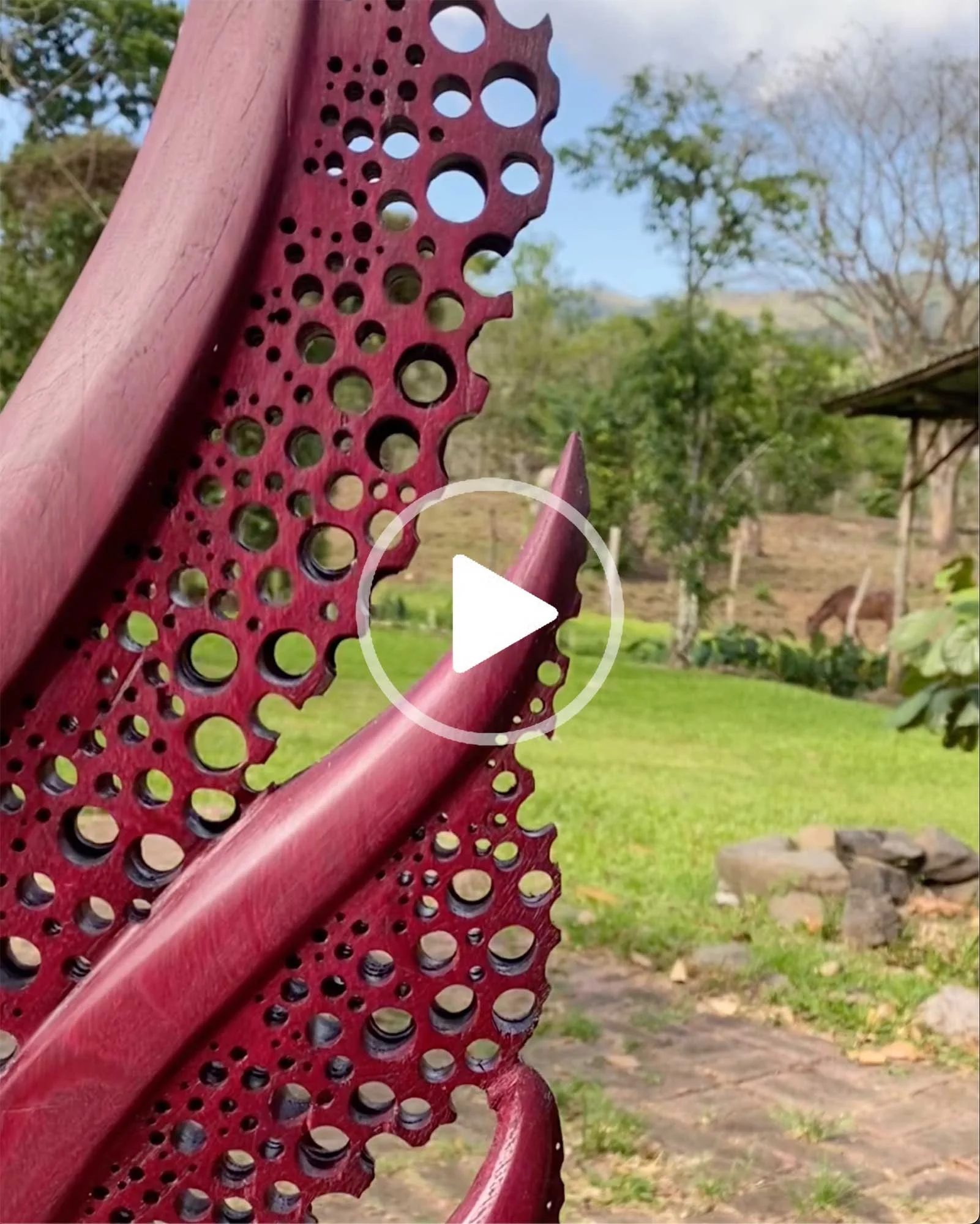 Video showing the handcrafted details of Organika, highlighting the interplay of light, shadow and organic carved forms in Nazareno hardwood.
