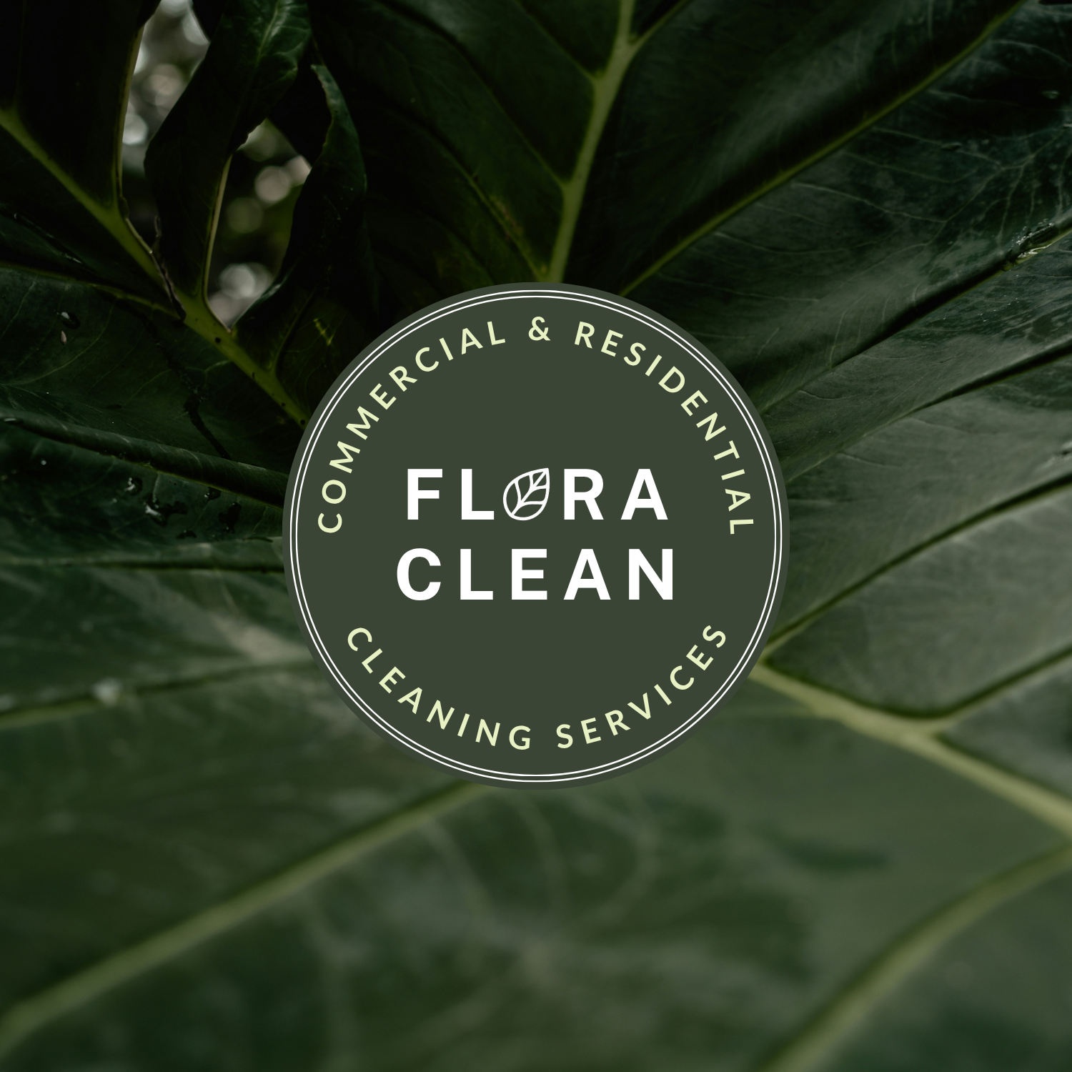 A logo with a dark green background featuring large green leaves in the background, and white text inside a circular border that reads 'Commercial & Residential Cleaning Services' surrounding the words 'Flora Clean' with a small leaf replacing the second 'O'.