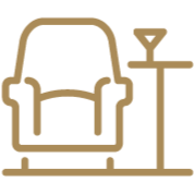 Line drawing of an armchair next to a standing floor lamp.