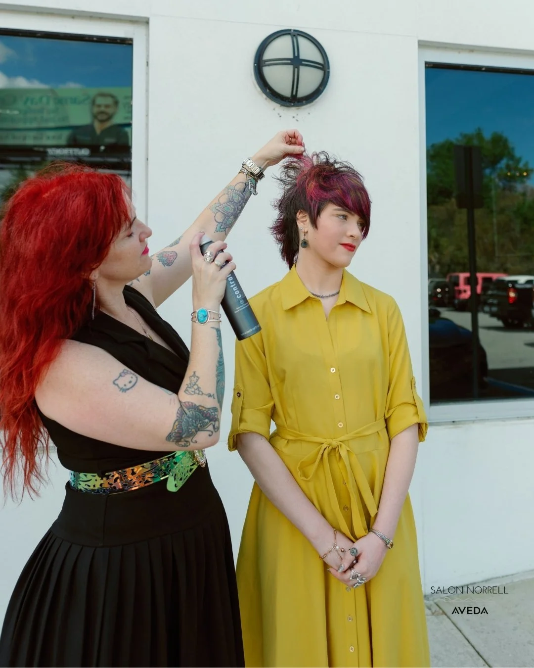 Kristine — wigs, dimensional brunette, toppers, and balayage stylist at Salon Norrell AVEDA in Carrollwood Tampa posing full highlight and fashion color services on model