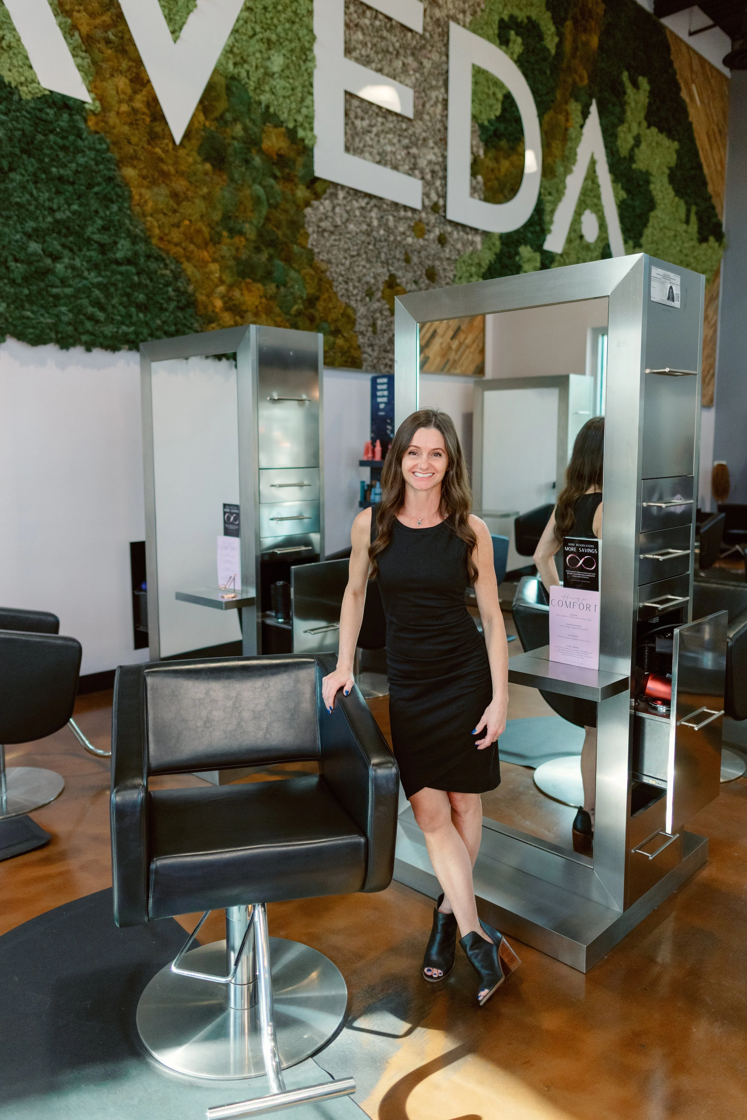 Amberlee — precision cutting, dimensional color, and textured hair specialist at Salon Norrell AVEDA in Carrollwood Tampa