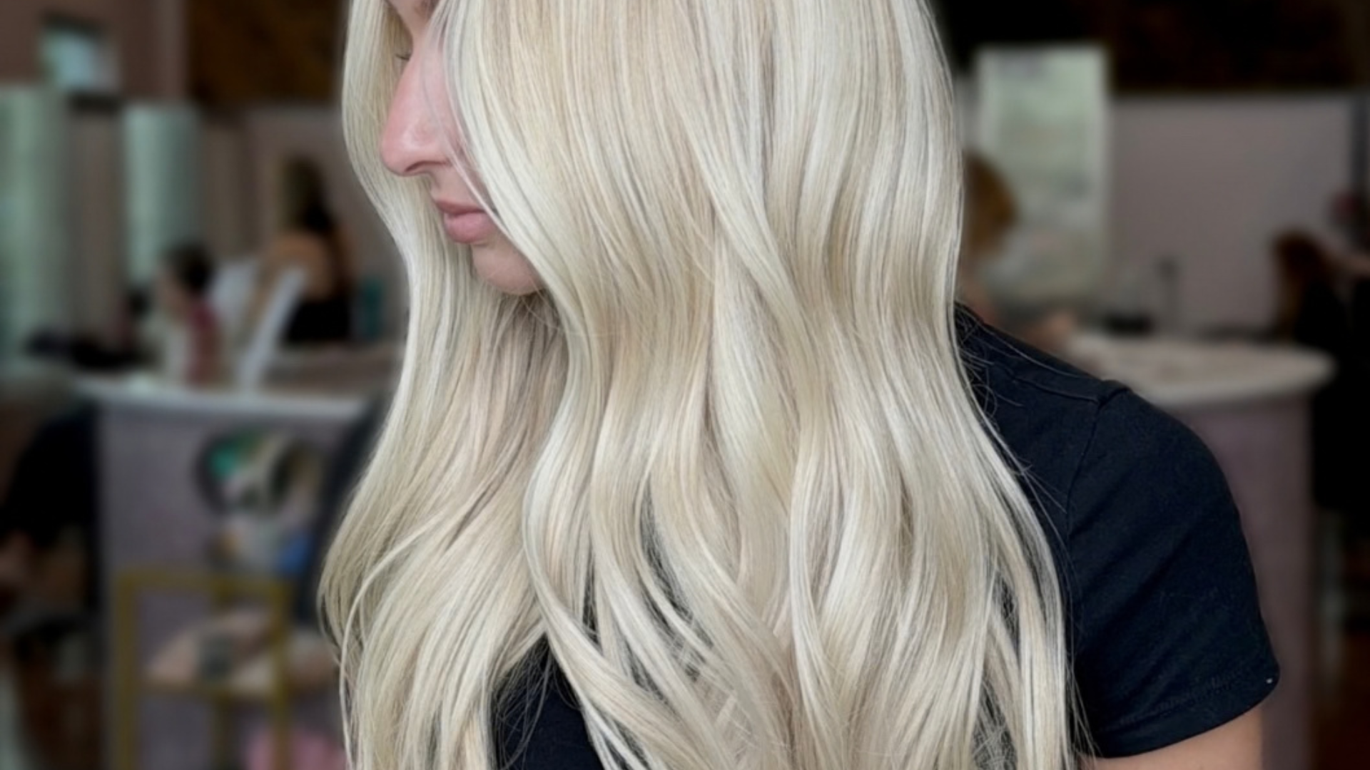 Healthy and luxurious blonde hair color transformation at Salon Norrell Aveda Tampa Florida.