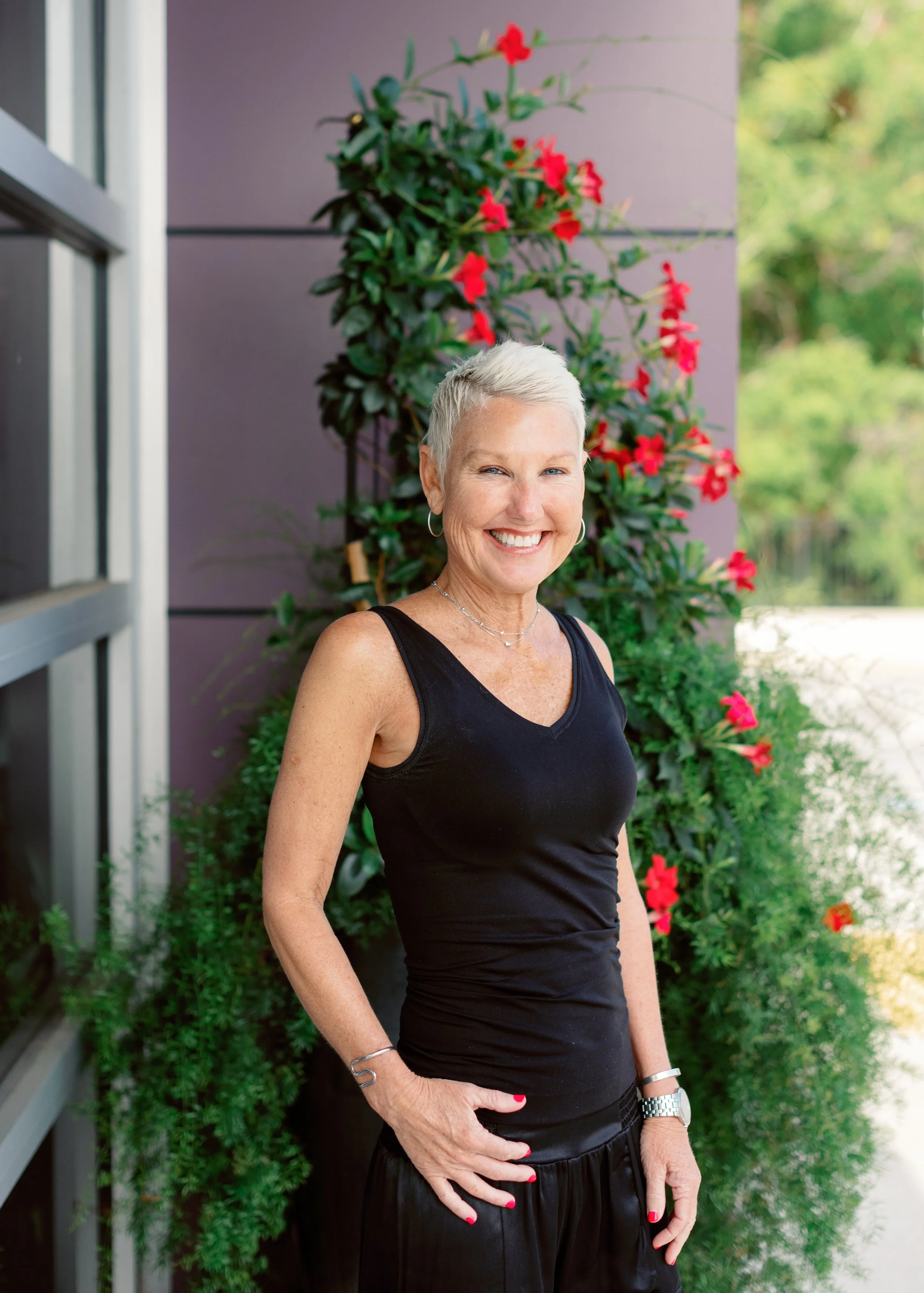 Lori — dimensional color, men's haircuts, pixies, and precision haircut specialist at Salon Norrell AVEDA in Carrollwood Tampa