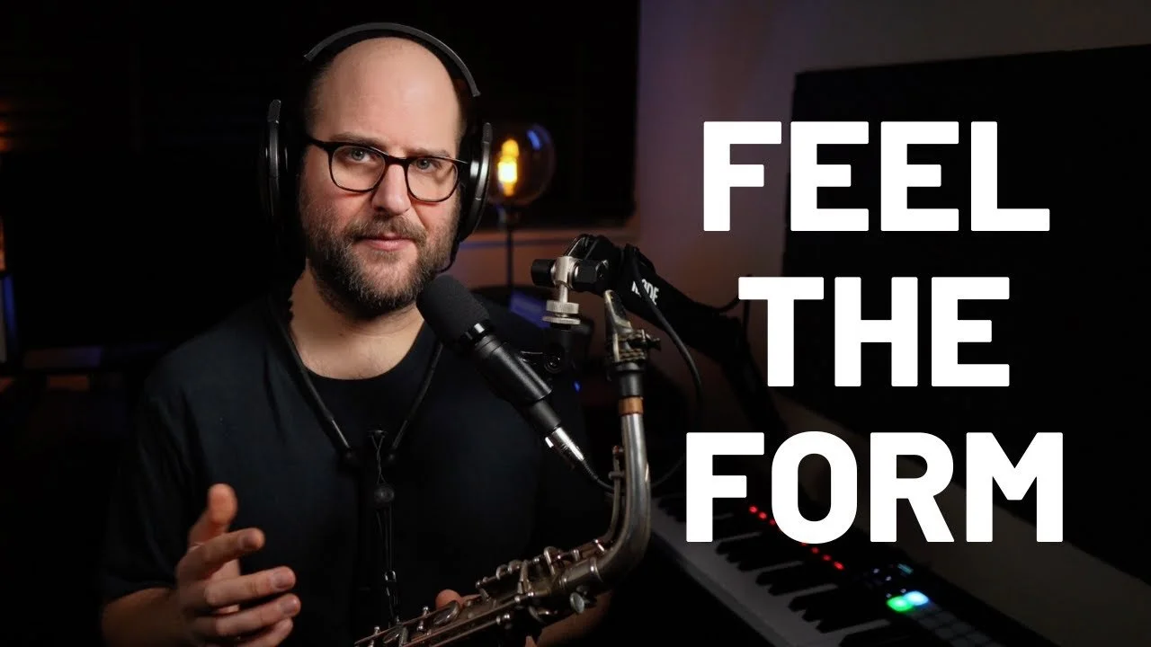 Mike Chillingworth holding a saxophone looking into the camera, with a text overlay that reads 'FEEL THE FORM'.