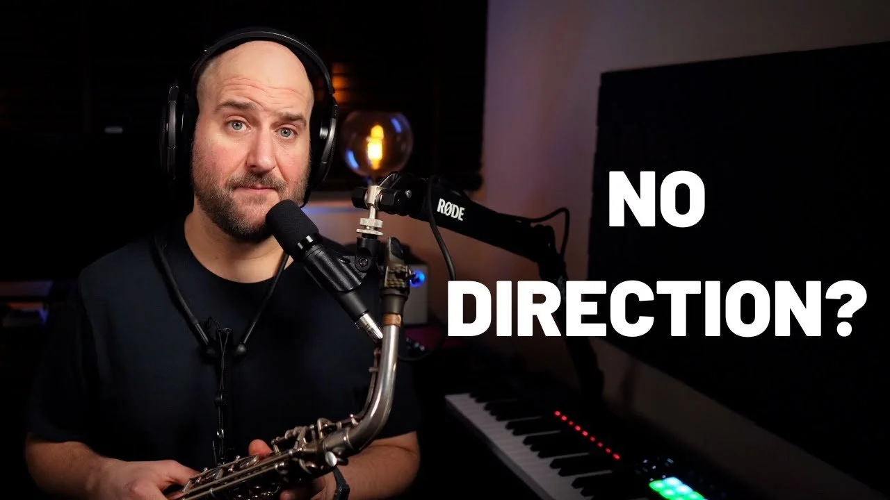 Mike Chillingworth holding a saxophone looking into the camera, with a text overlay that reads 'NO DIRECTION?'.