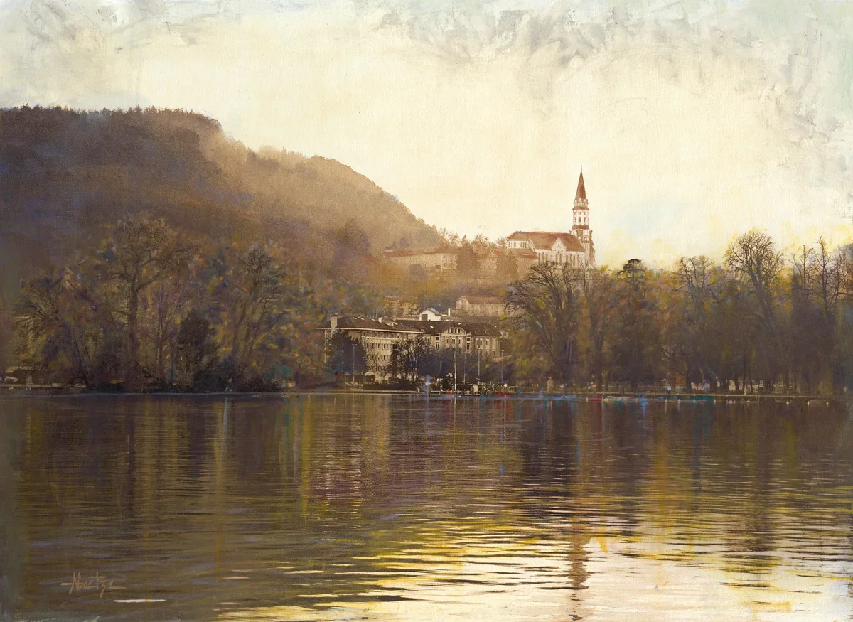 A watercolor painting of a lake with reflections of trees and buildings along the shoreline, and a hillside with a church or cathedral with a tall steeple in the background.