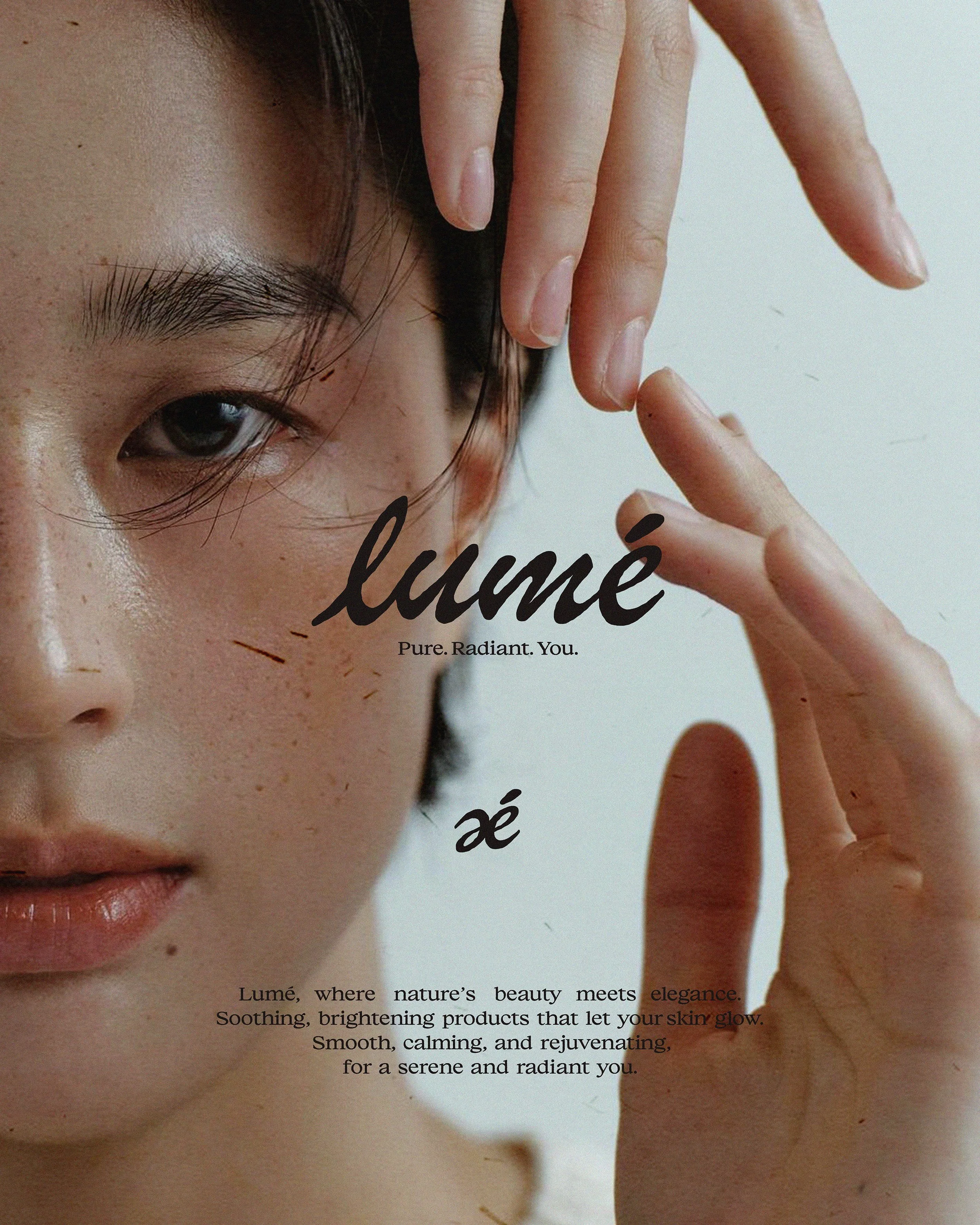 Close-up of a woman's face and hand positioning, with partially visible text overlay that reads 'lumié'.