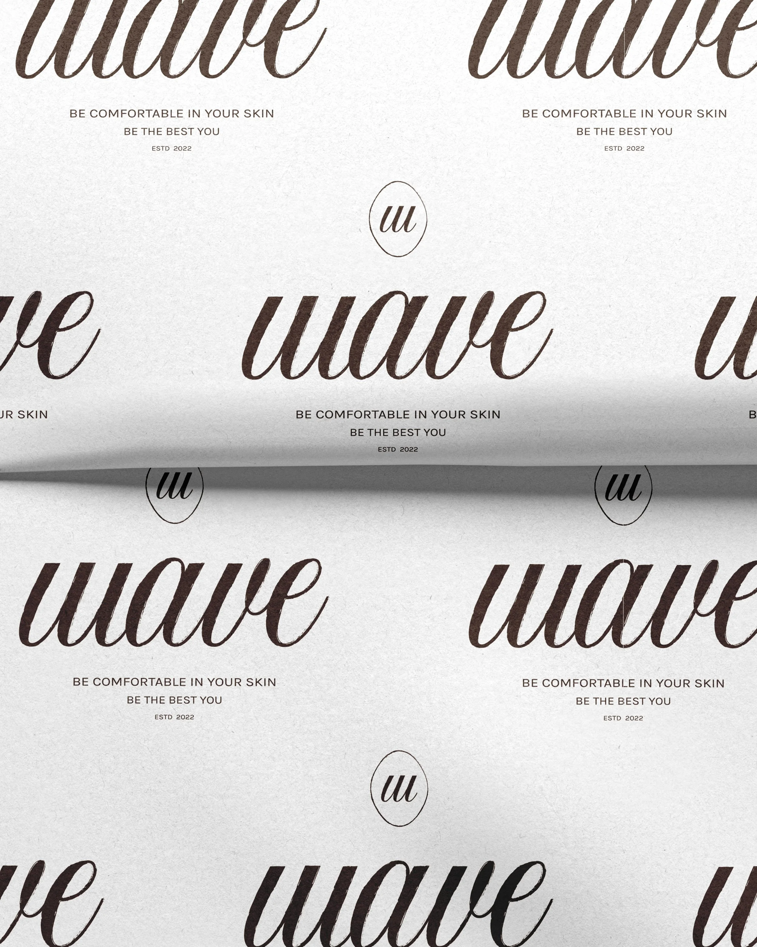 Repeated pattern with the word "uave" in cursive script, with a message "Be comfortable in your skin, be the best you" and "Est. 2022" in smaller font, and a logo "u" inside a circle.