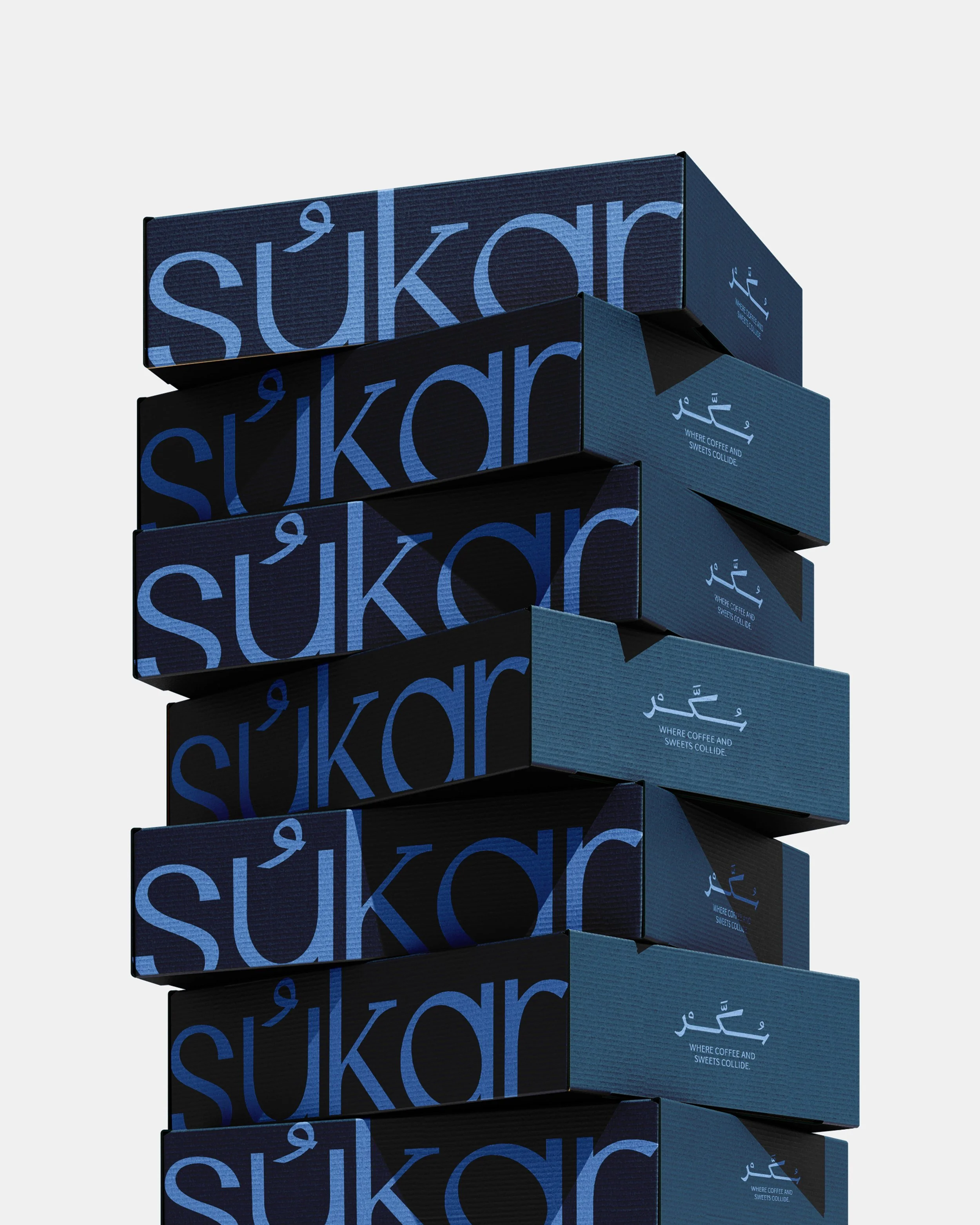 Stacked blue boxes with the brand name 'sukkar' written in large font on the side, and a logo with Arabic script and the phrase 'Where coffee and sweets collide' on the front.