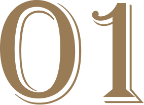 Close-up of the number 01 in gold against a black background.