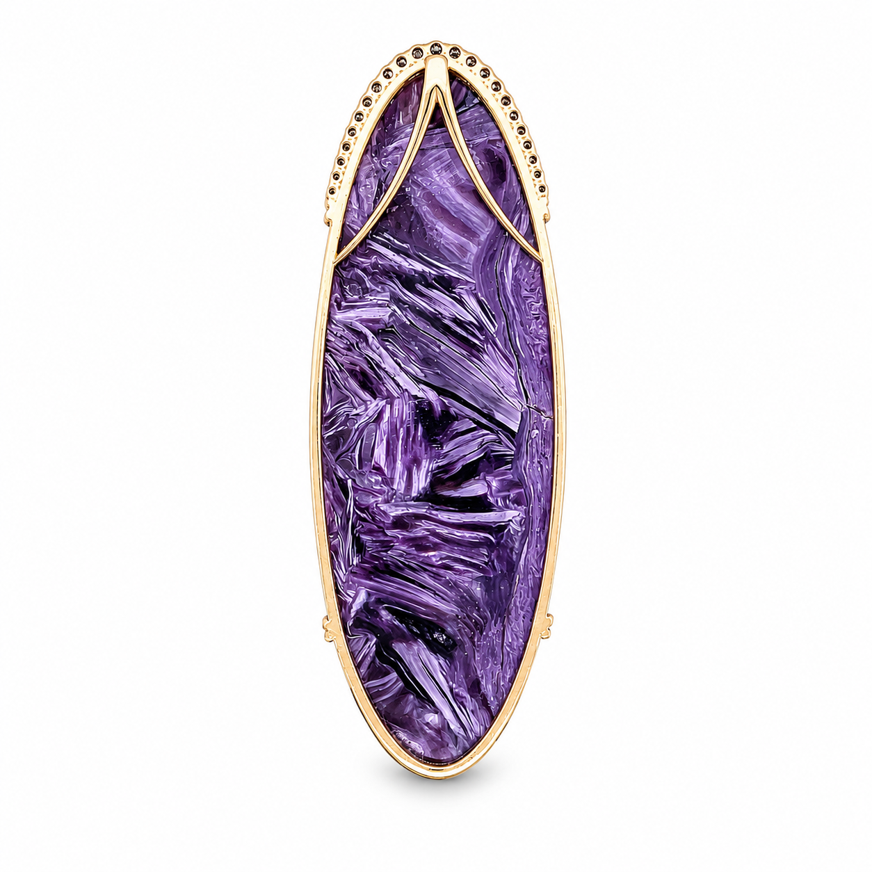 A gold framed jewelry piece with an elongated oval-shaped purple gemstone with a textured, marbled surface.