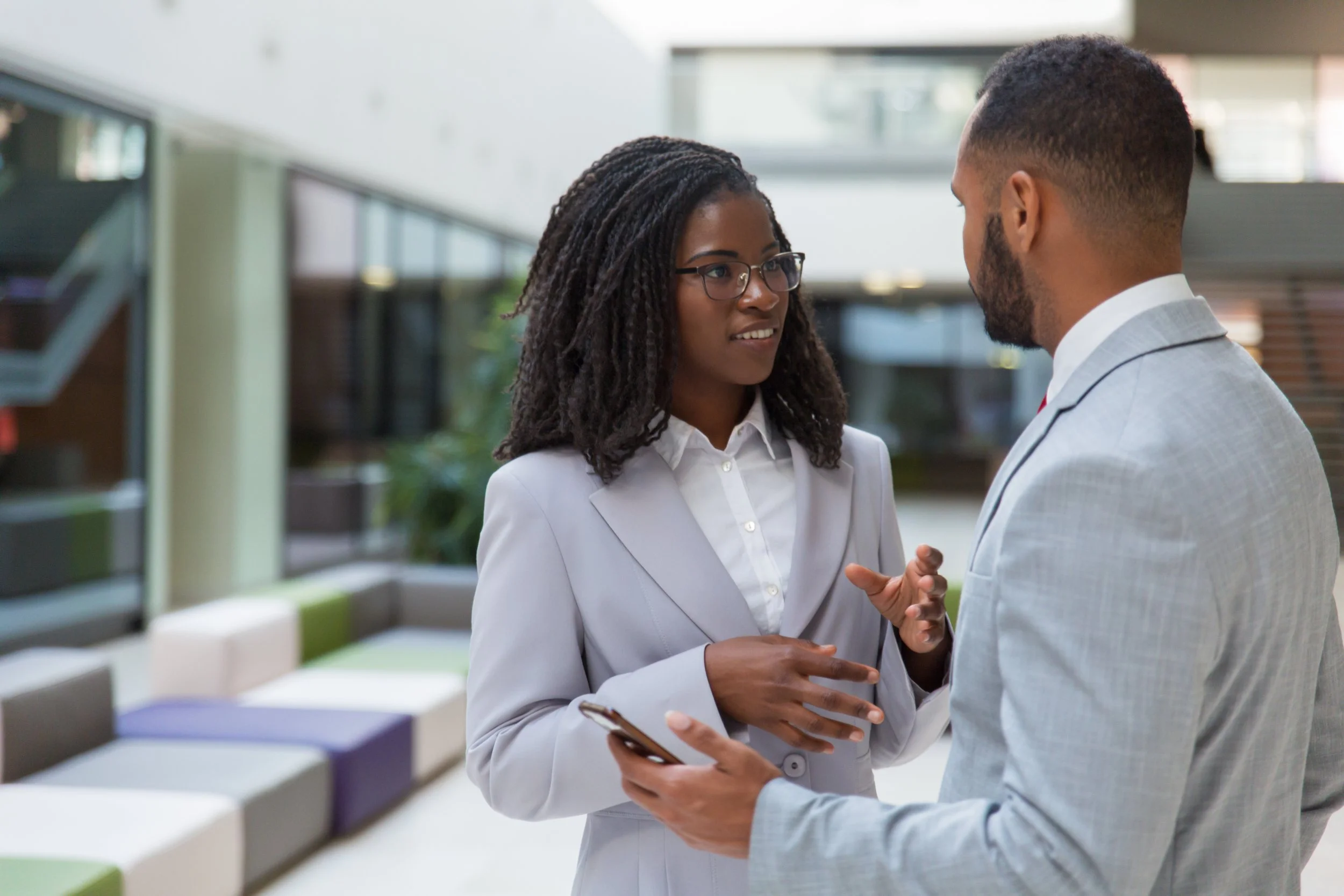 smiling-young-business-people-talking.jpg