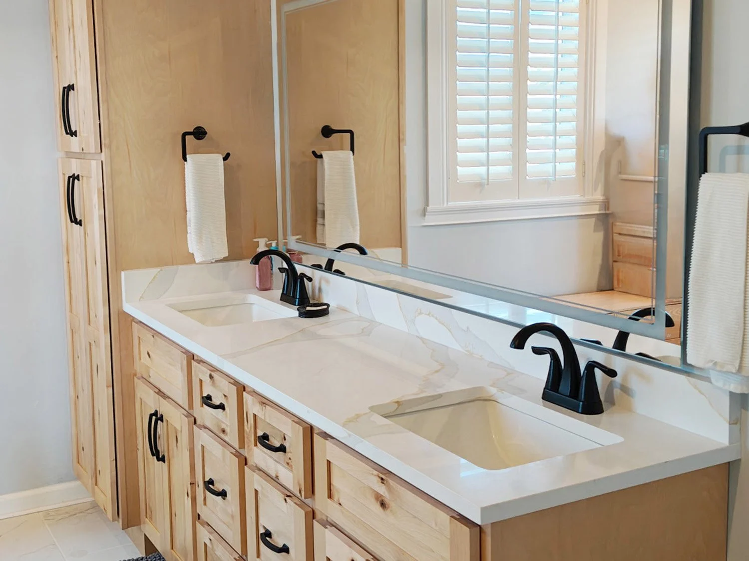 Bathroom remodel with warm wood tones