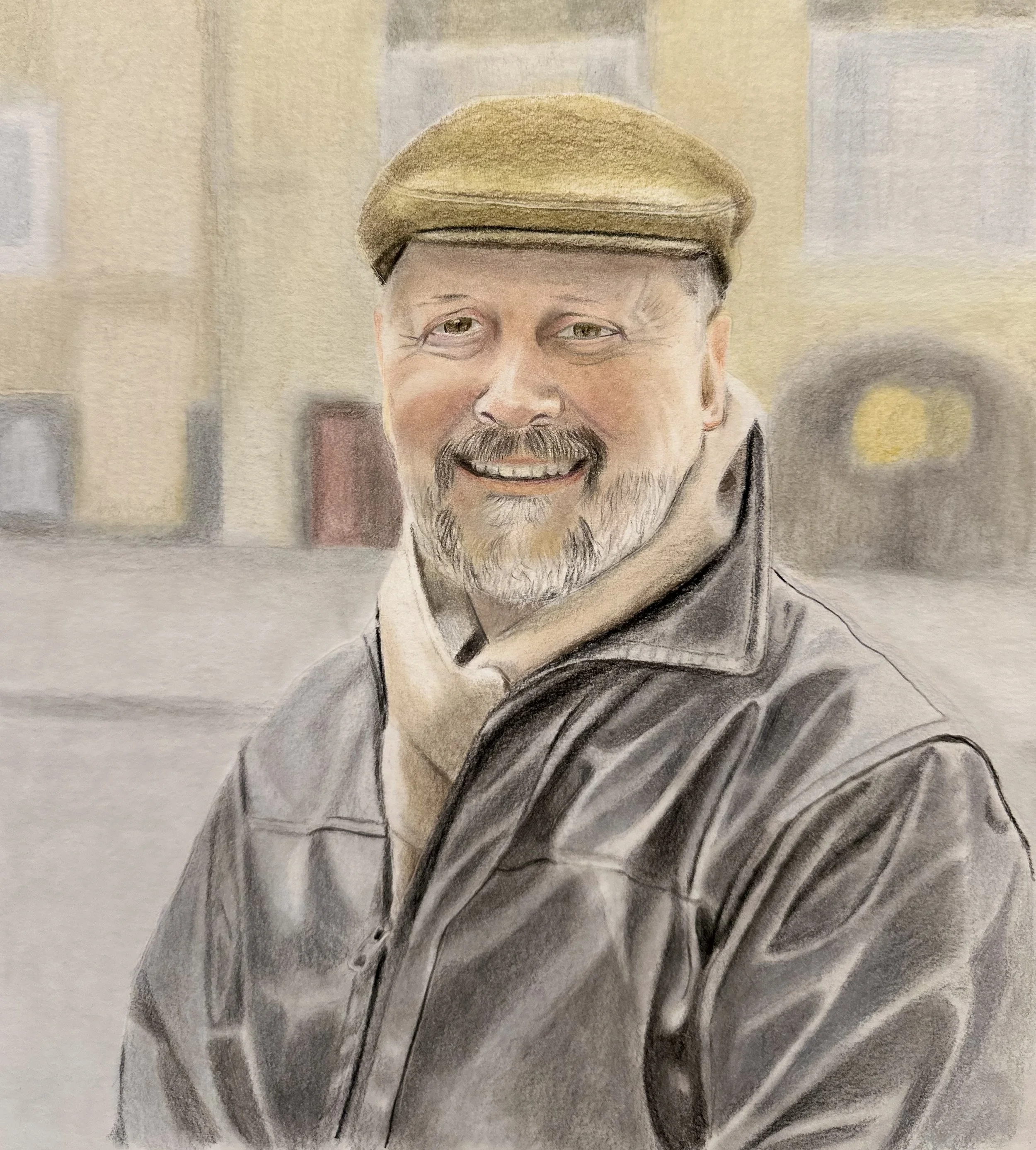 A close-up watercolor portrait of a smiling man wearing a beige cap and a gray hoodie, with a background of blurred buildings.