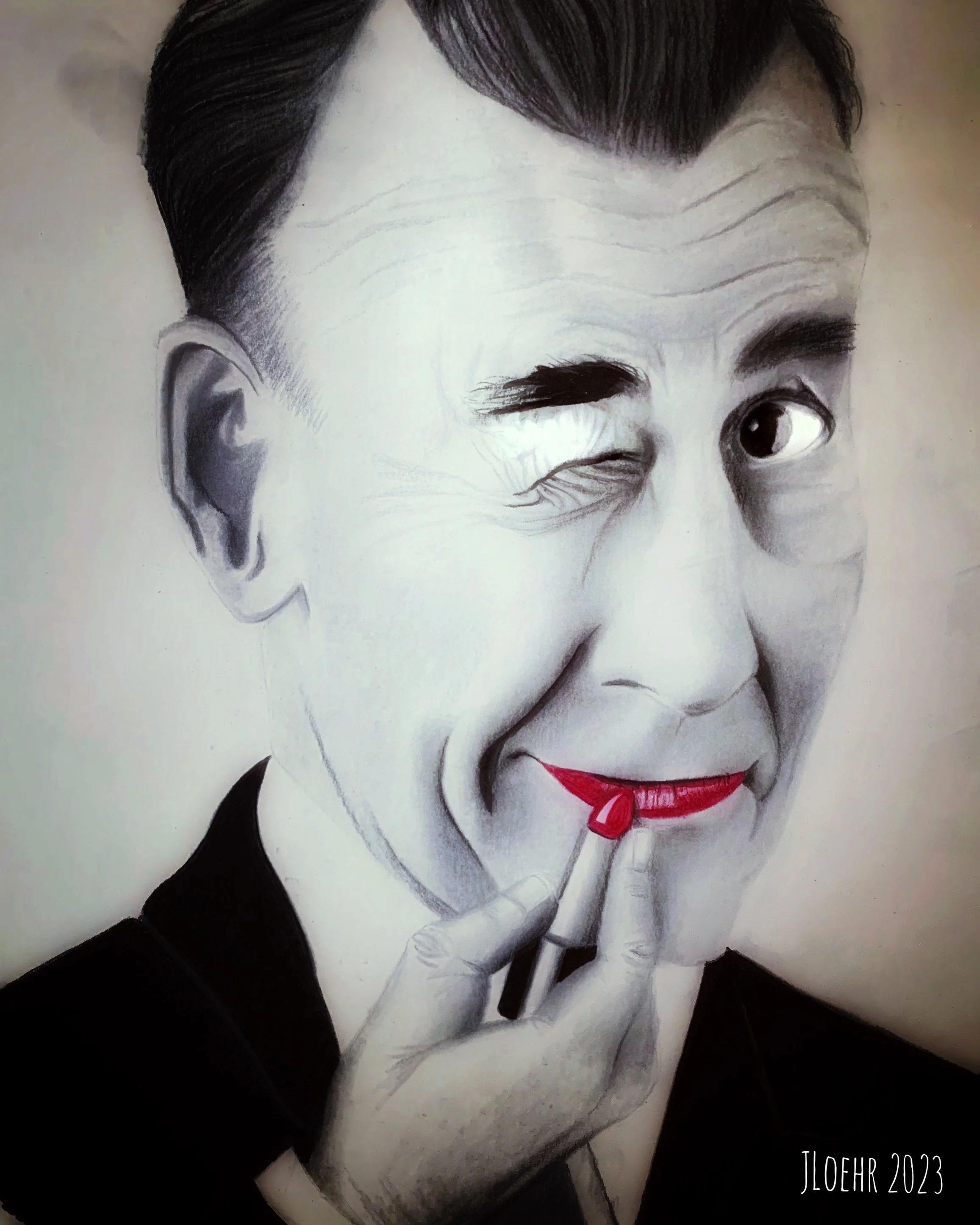 Black-and-white portrait of a woman with short dark hair, winking and smiling, with red lipstick and painted nails, touching her lips with one finger, signed JLOEHR 2023 in the bottom right corner.