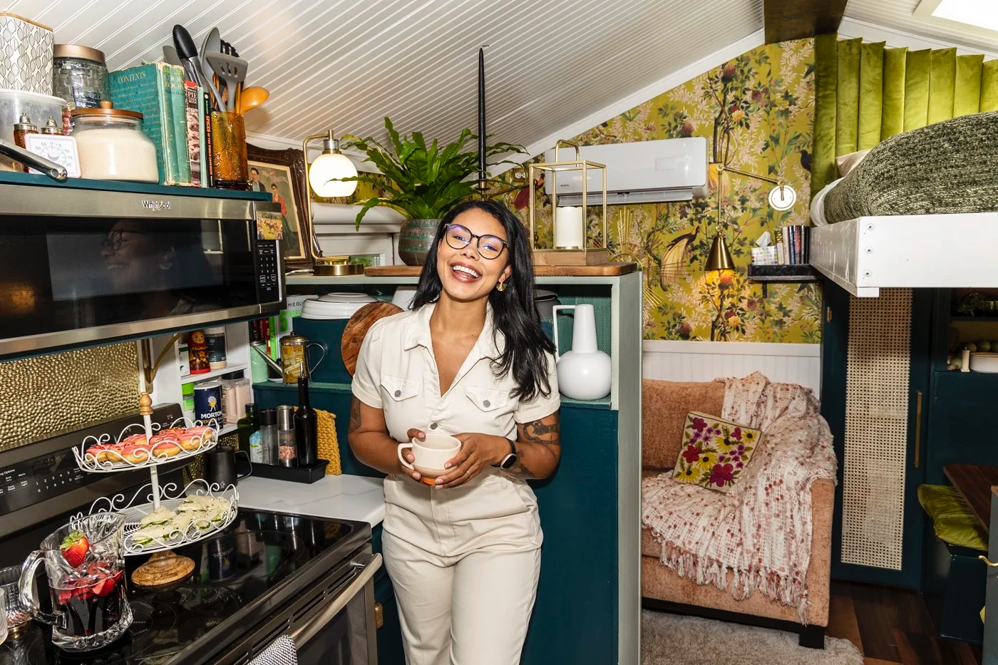 woman+standing+inside+colorful+diy+tiny+home+.png