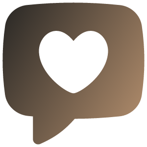 A close-up of a heart-shaped coffee foam art in a brown coffee mug.