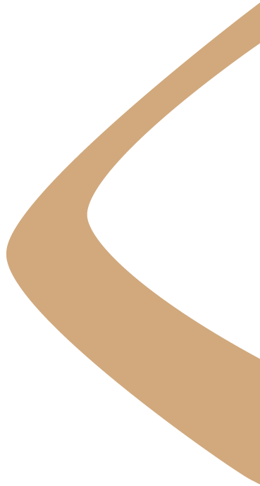 Close-up of a curved beige or tan road or path on a black background.