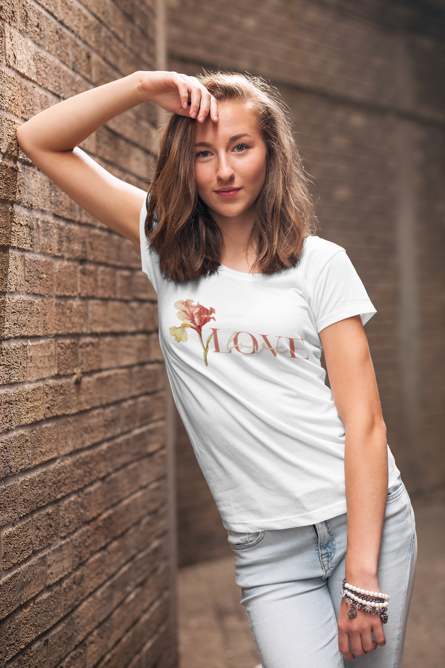 mockup-of-a-young-woman-wearing-a-customizable-t-shirt-and-leaning-against-a-brick-wall-2764-el1.png