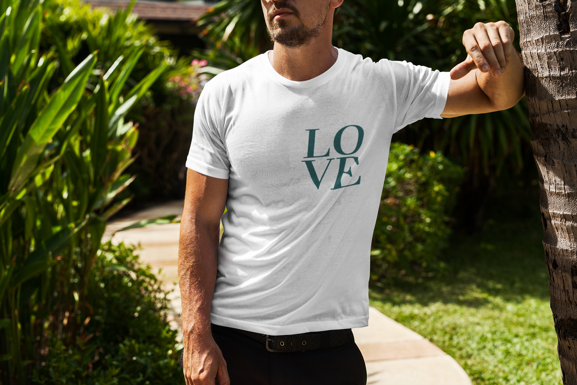 t-shirt-mockup-of-a-bearded-man-leaning-on-a-palm-tree-2254-el1.png