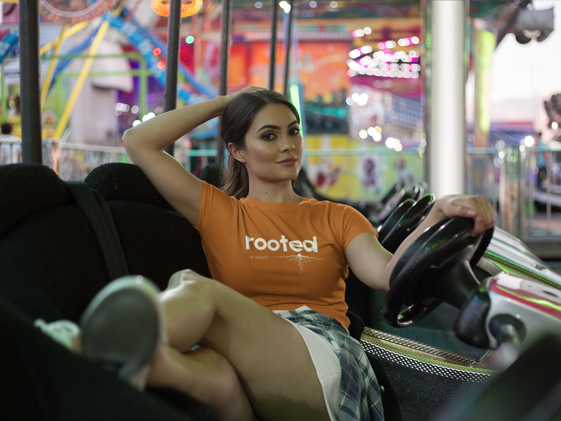woman-posing-wearing-a-crop-top-tee-mockup-at-the-arcade-a19442.png