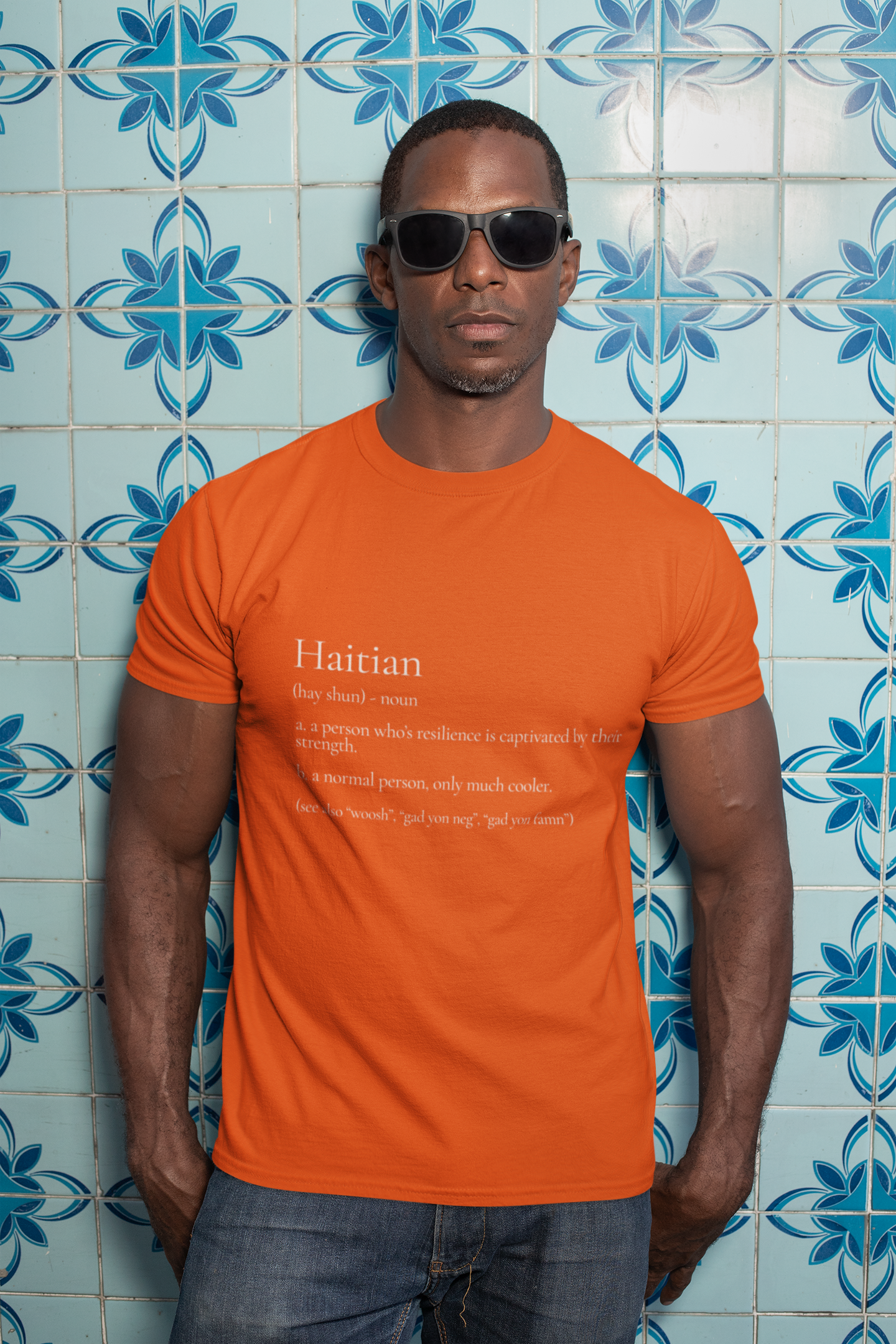 t-shirt-mockup-of-a-man-with-sunglasses-against-a-blue-tiling-30449.png