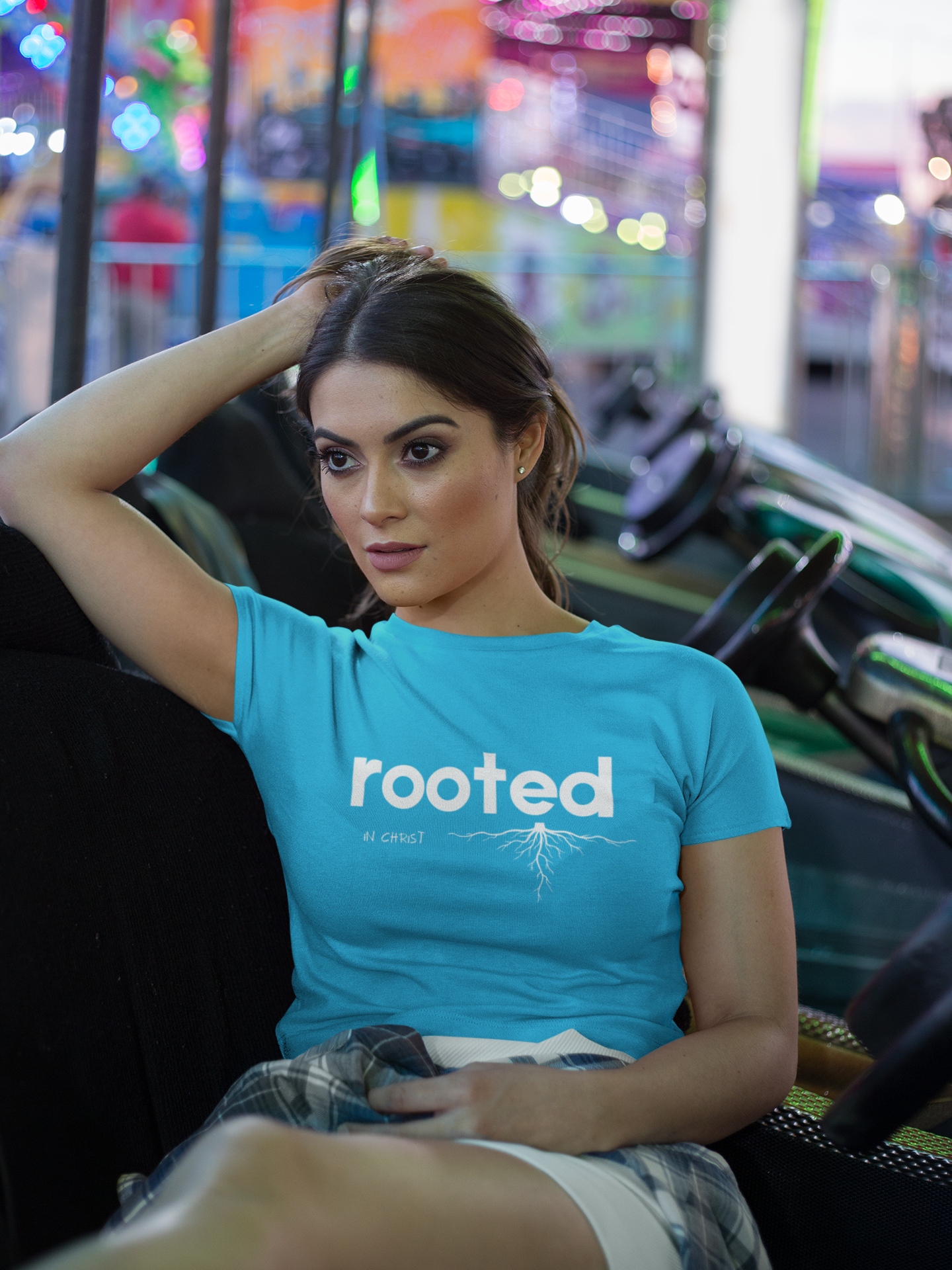 crop-top-tee-mockup-being-worn-by-a-girl-lying-on-the-arcade-car-games-a19440 (2).png