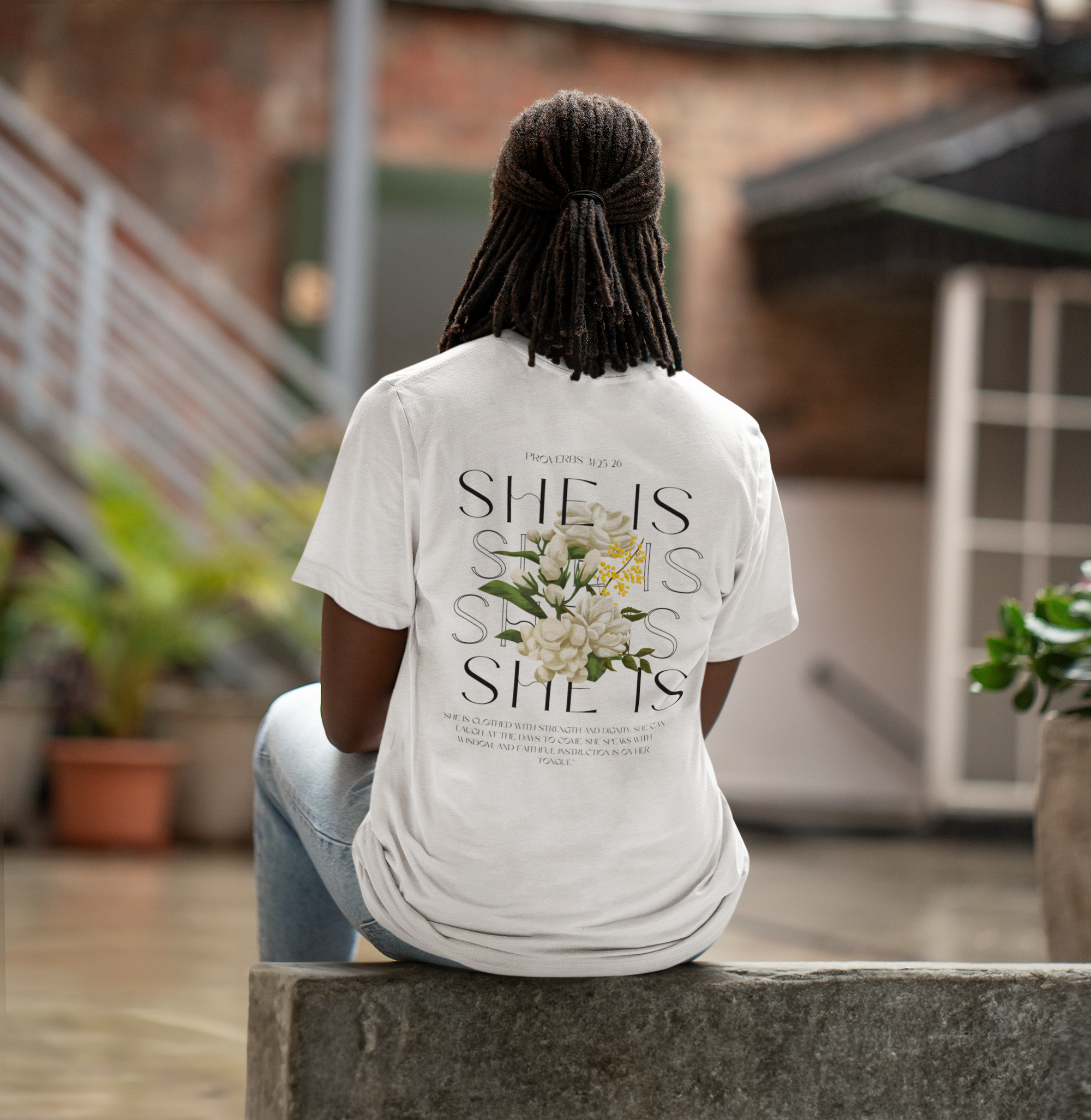 back-view-mockup-of-a-woman-with-locs-wearing-a-bella-canvas-t-shirt-m39805.png