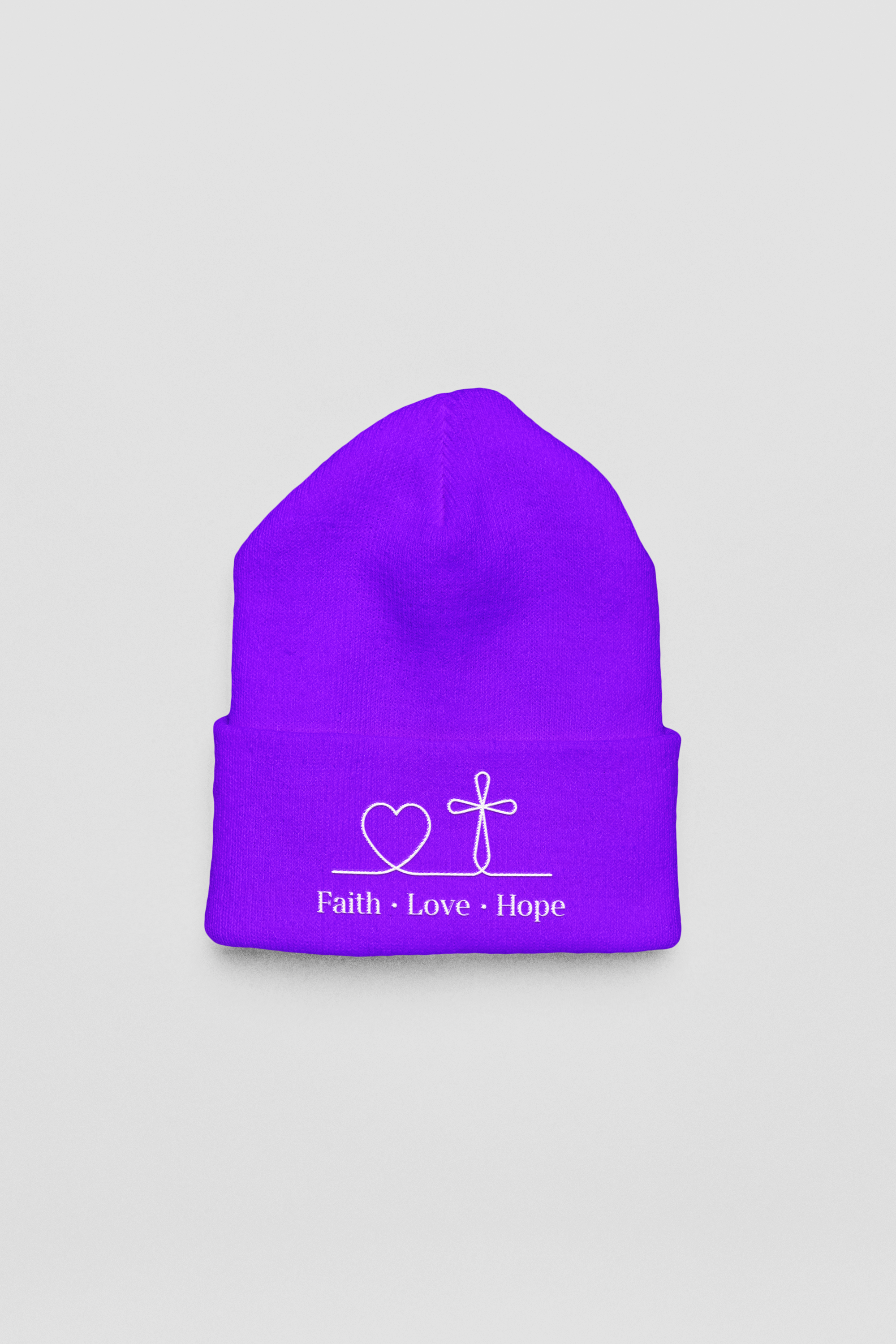 mockup-of-a-yupoong-beanie-lying-on-a-colorful-setting-m35332 (4).png