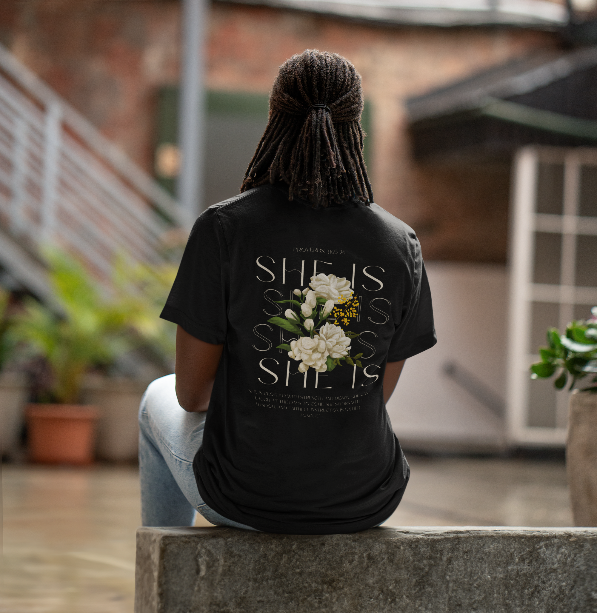back-view-mockup-of-a-woman-with-locs-wearing-a-bella-canvas-t-shirt-m39805 (1).png