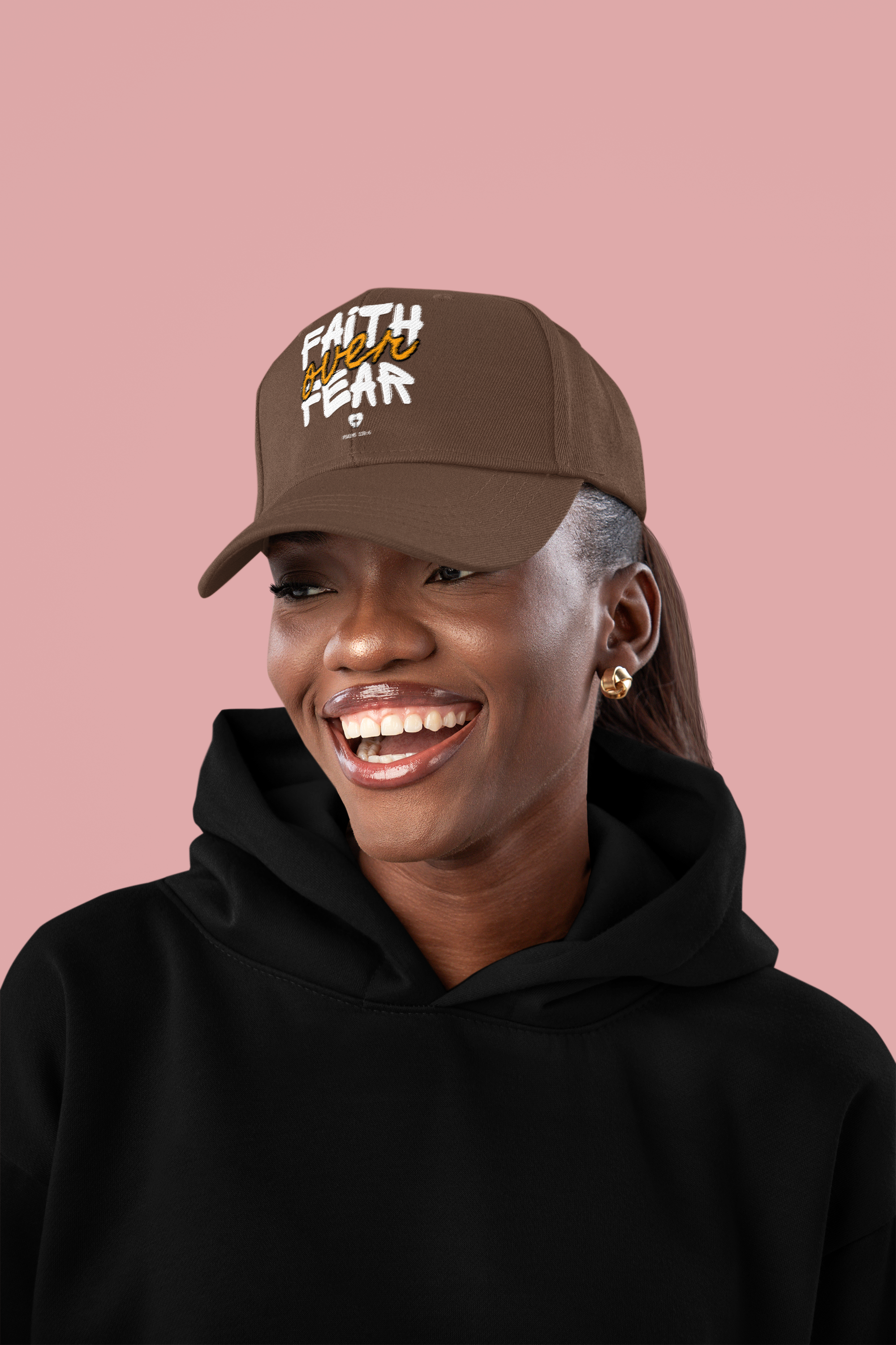 dad-hat-mockup-of-a-smiling-woman-wearing-a-pullover-hoodie-in-a-studio-m56566 (1).png