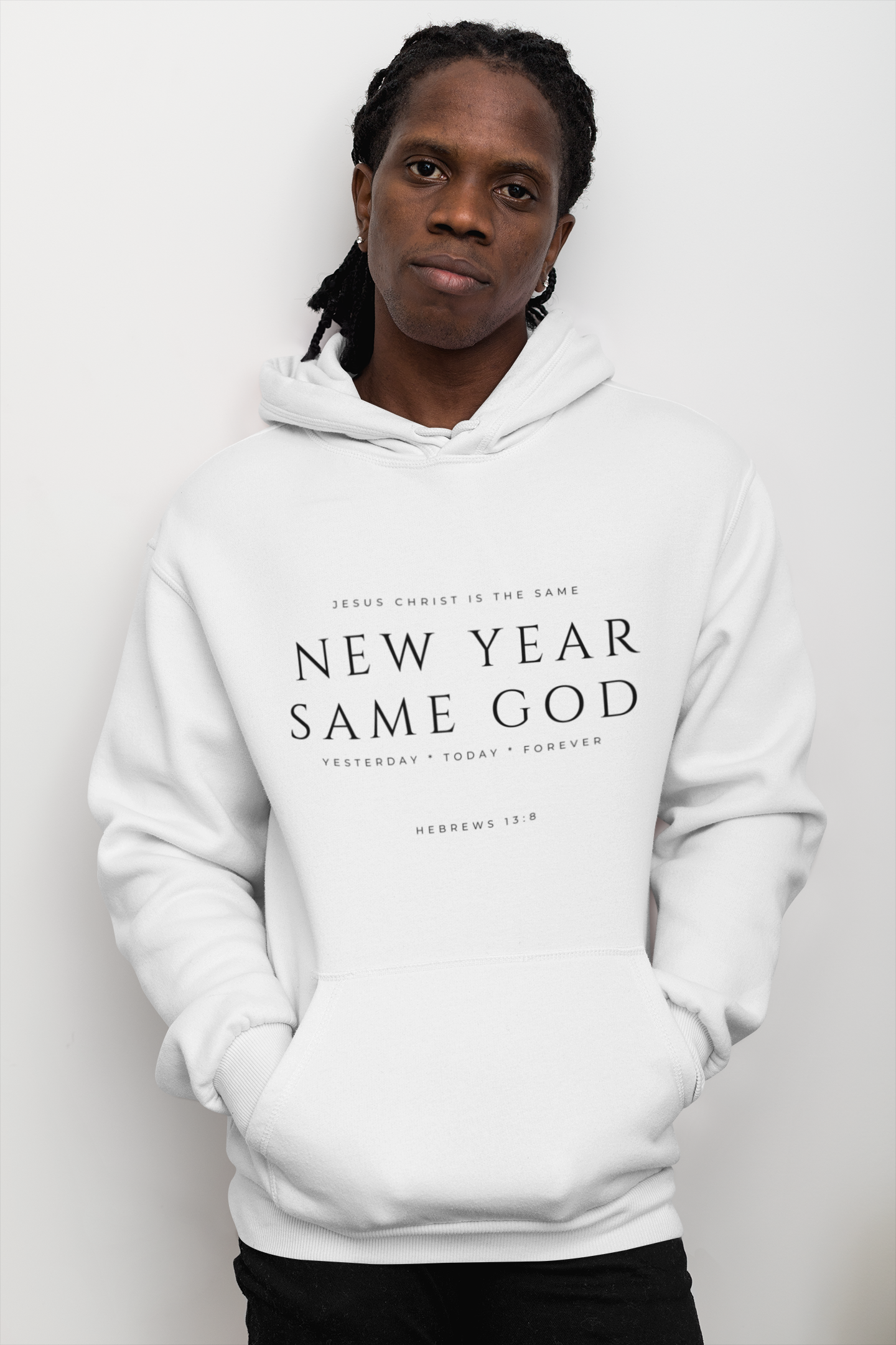 pullover-hoodie-mockup-featuring-a-serious-looking-man-by-a-clear-wall-30322.png