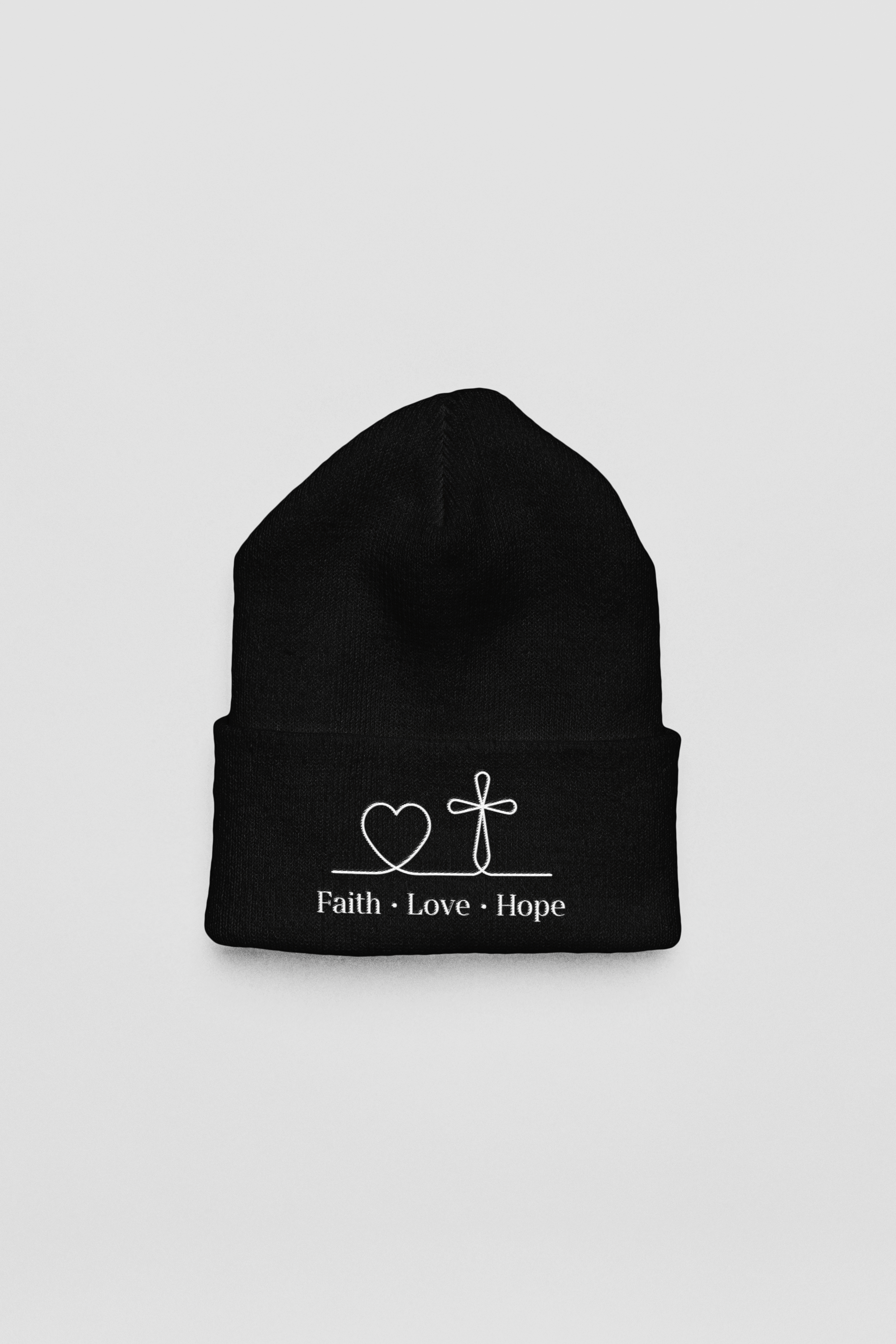 mockup-of-a-yupoong-beanie-lying-on-a-colorful-setting-m35332.png