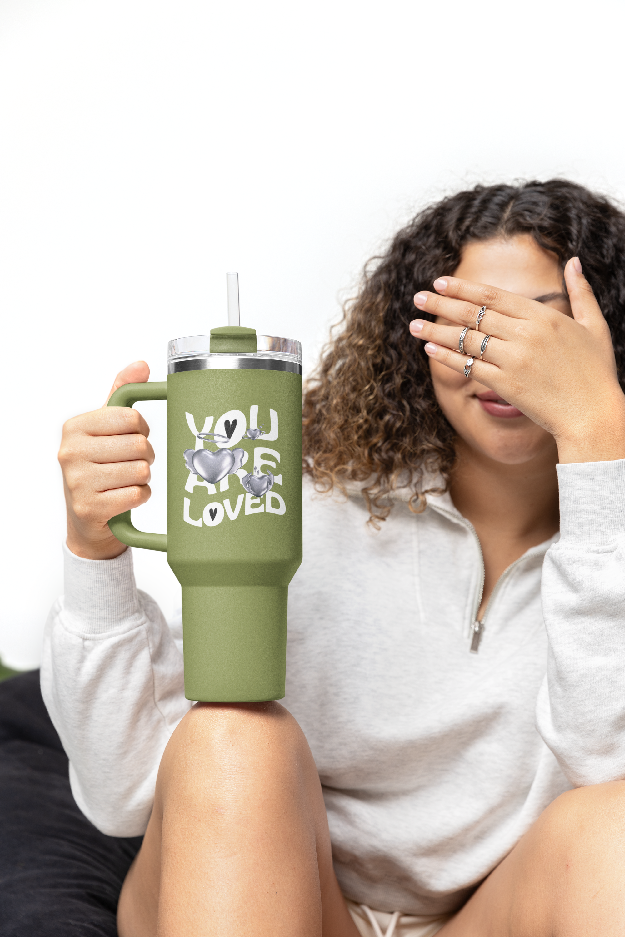 stanley-tumbler-mockup-featuring-a-woman-covering-her-face-with-her-hand-m40300.png