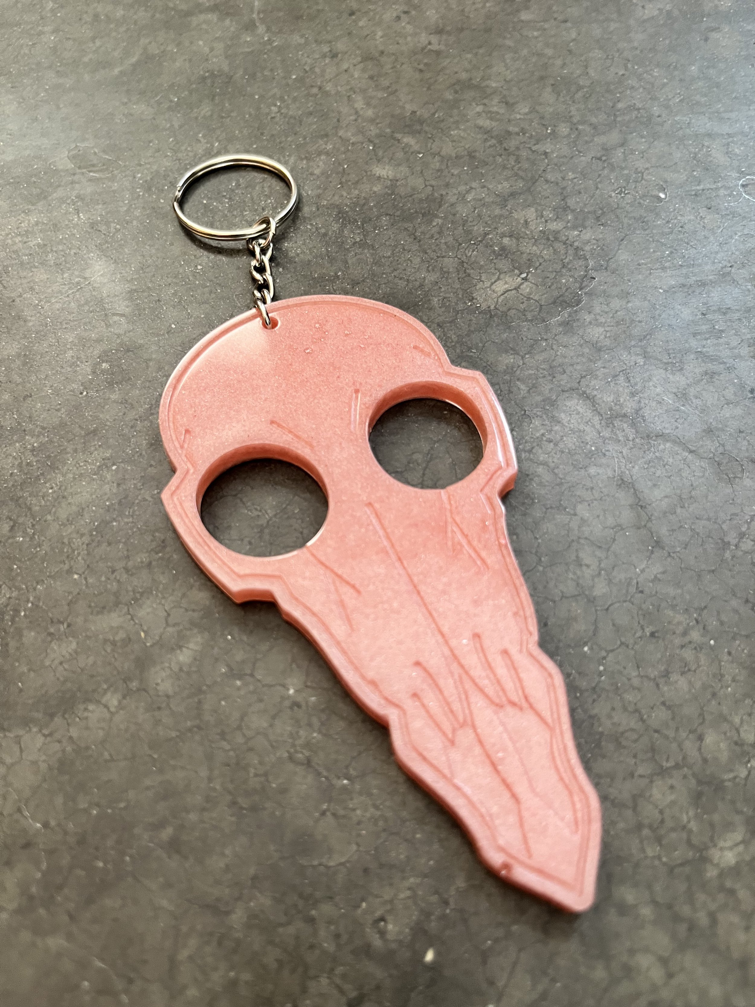 A resin epoxy emergency keychain.