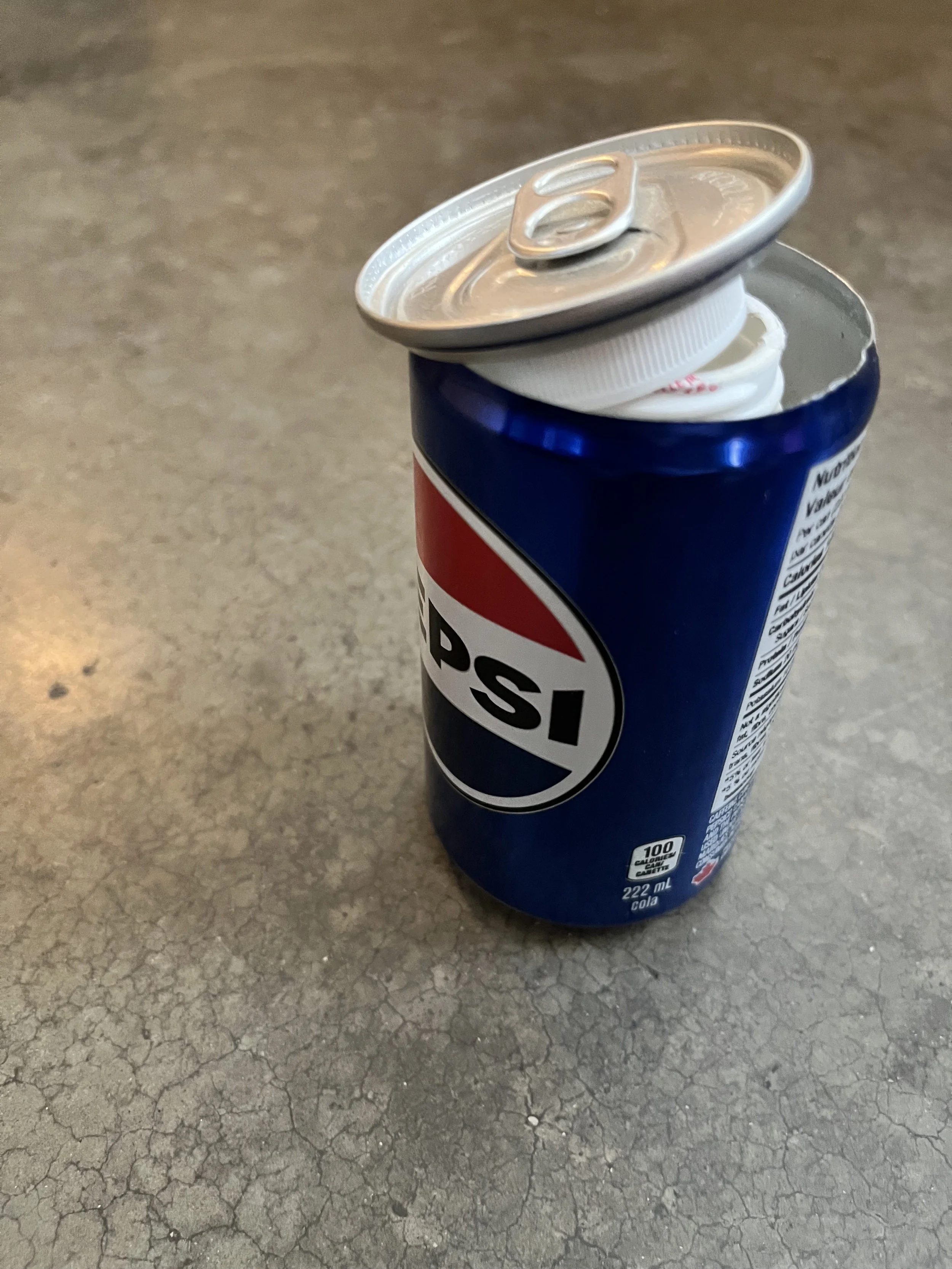 A small hidden soda stash can/safe.