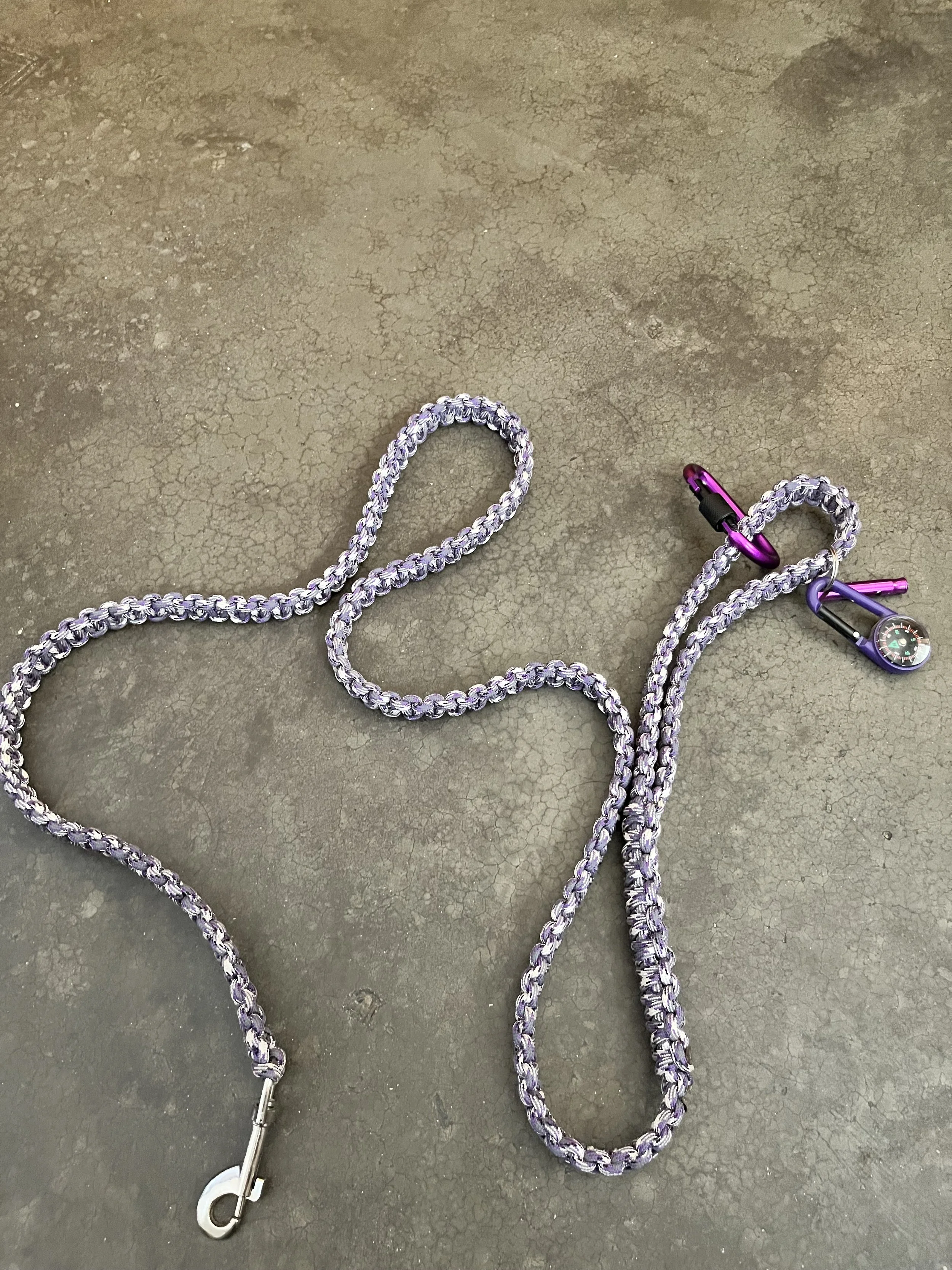 A purple paracord dog leash.