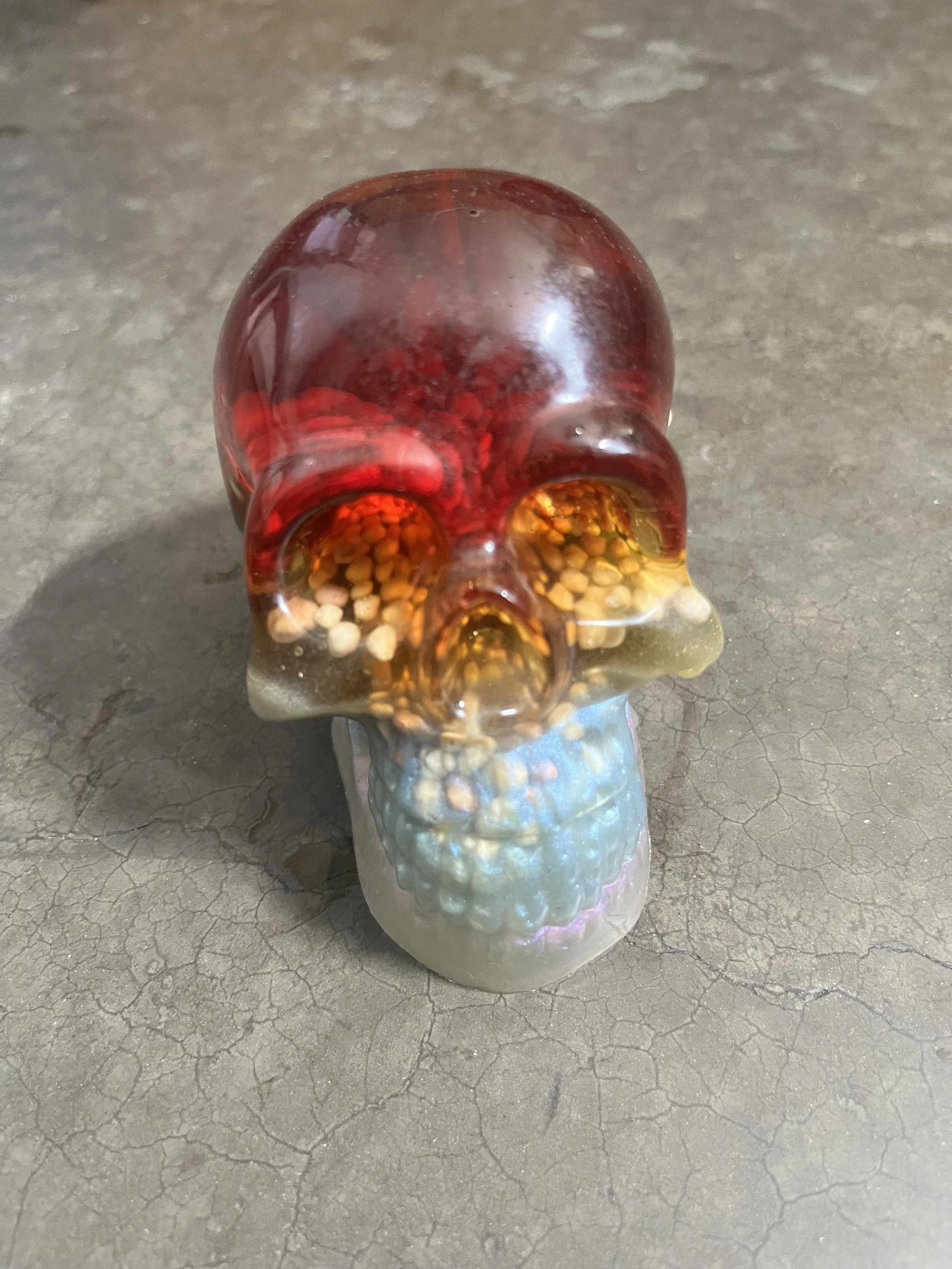 A handmade colorful epoxy resin skull.