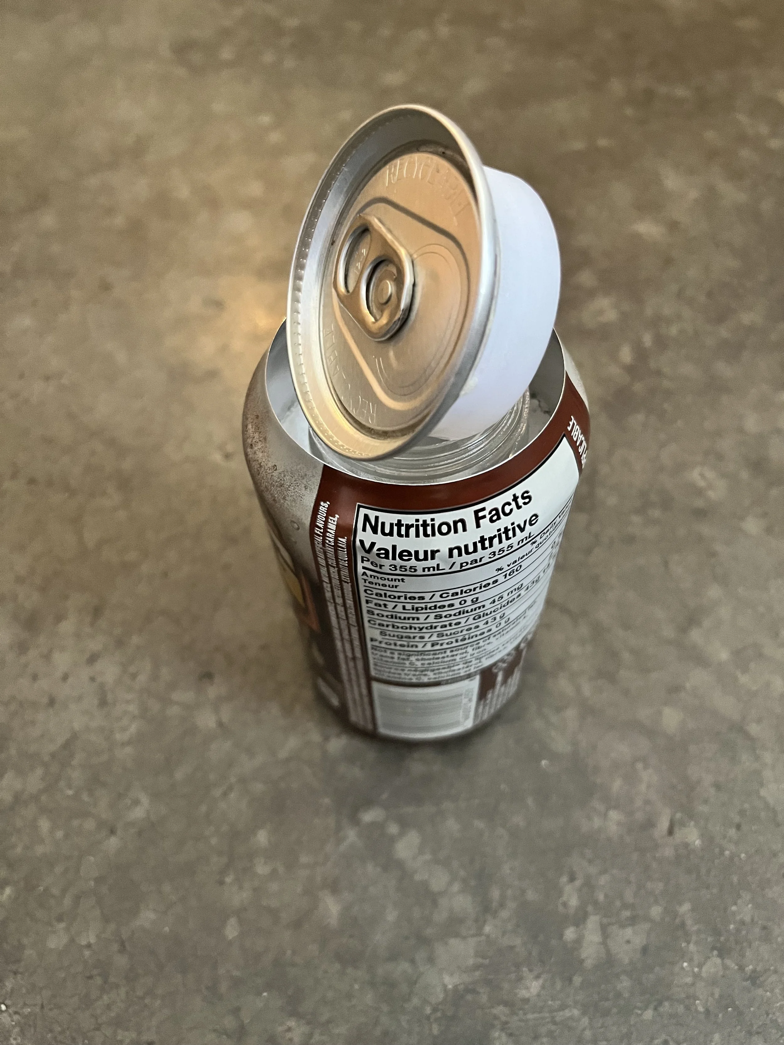 A handmade soda can stash or safe.The lid screws off.