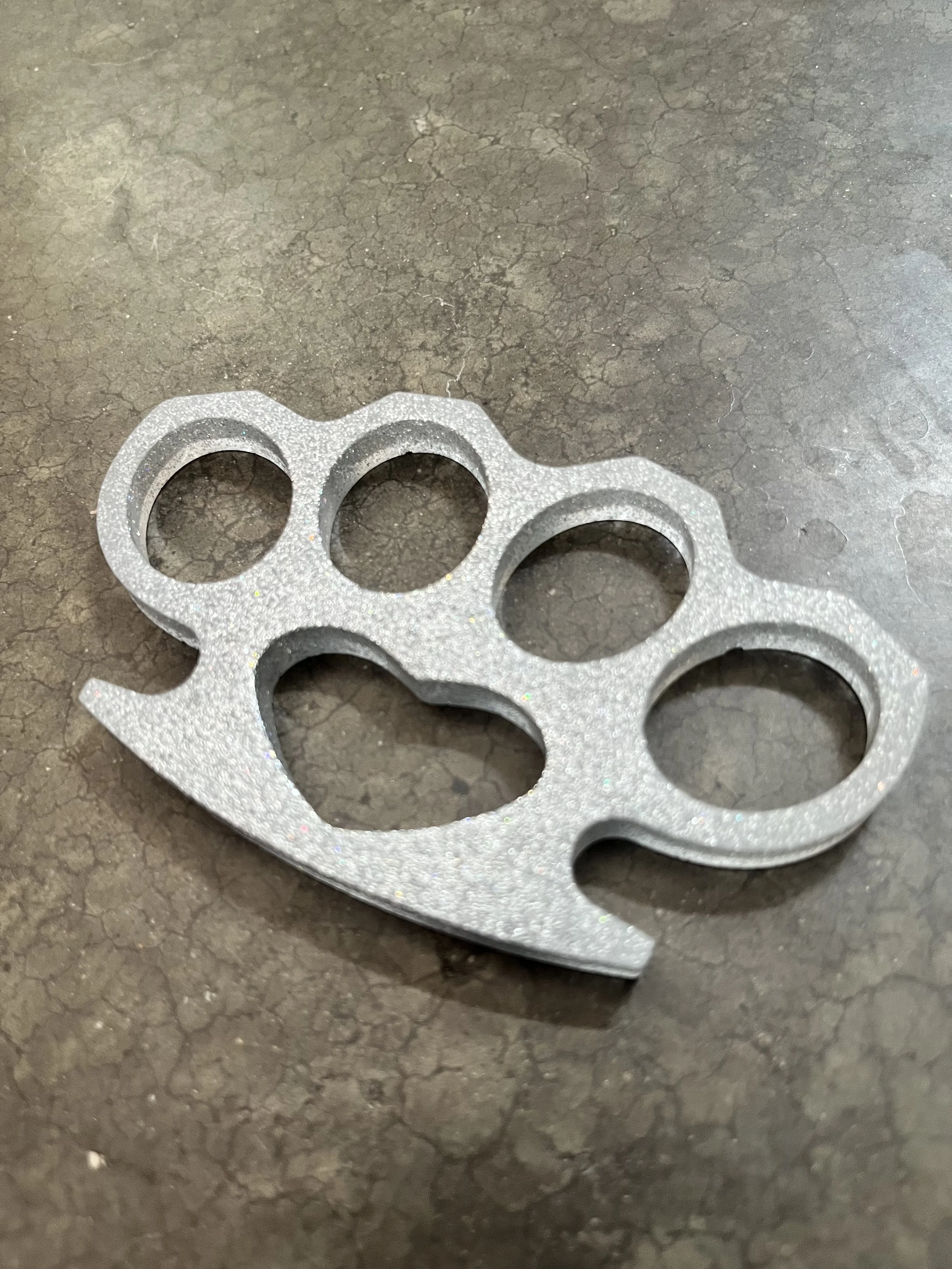 Silver glitter resin epoxy emergency knuckles.Totally legal.